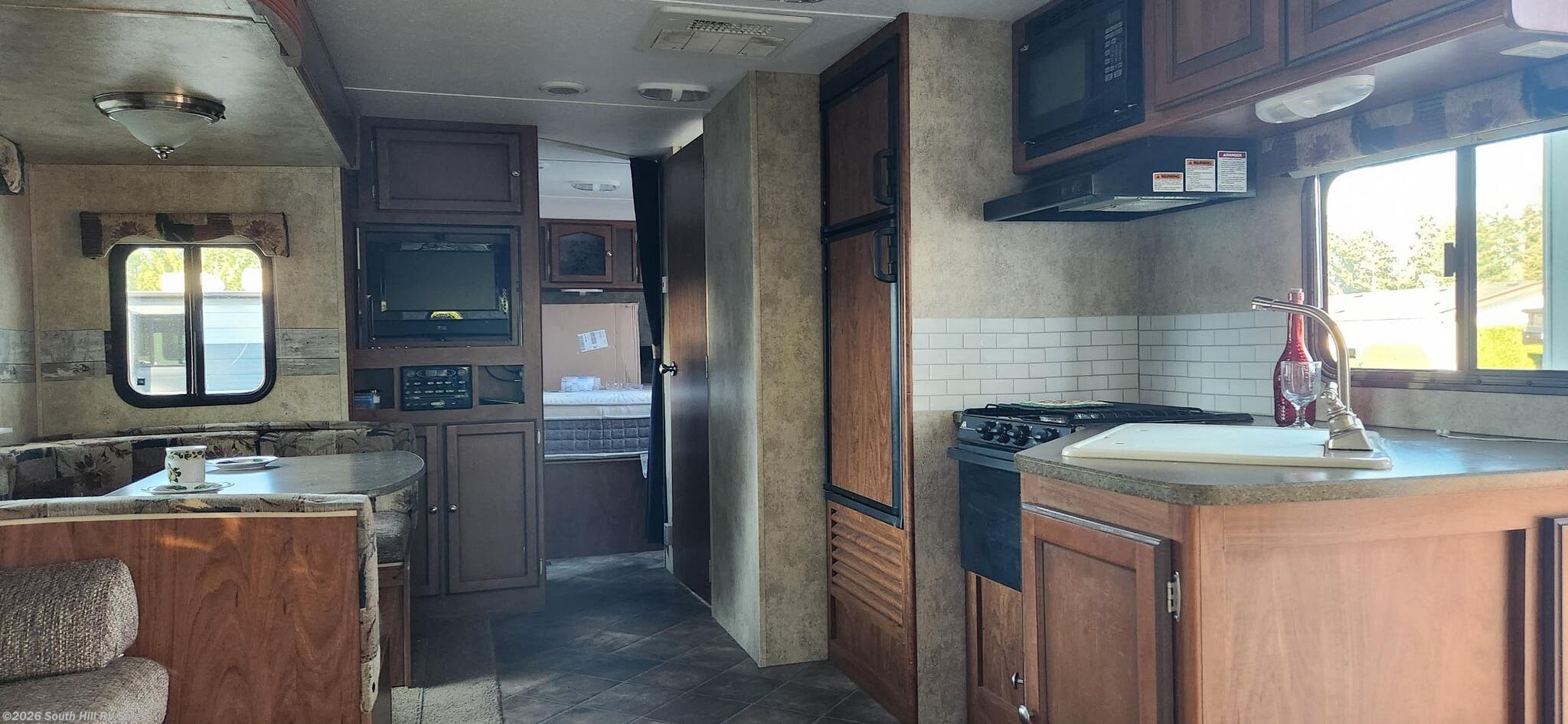 2012 Passport Ultra Lite 2850RL by Keystone from South Hill RV Sales in Puyallup, Washington