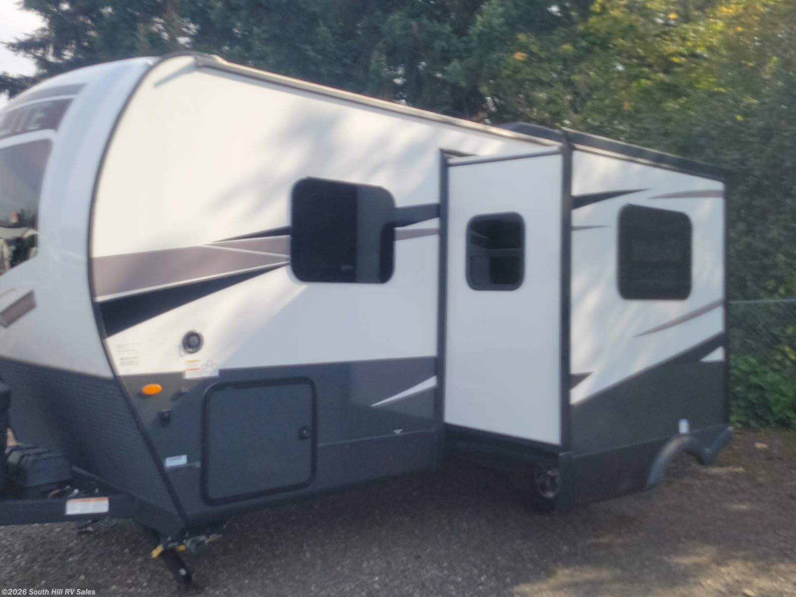 2024 Forest River Rockwood Mini Lite 2205S - Used Travel Trailer For Sale by South Hill RV Sales in Puyallup, Washington features Toilet, Theater Seating, Power Awning, TV Antenna, Ladder