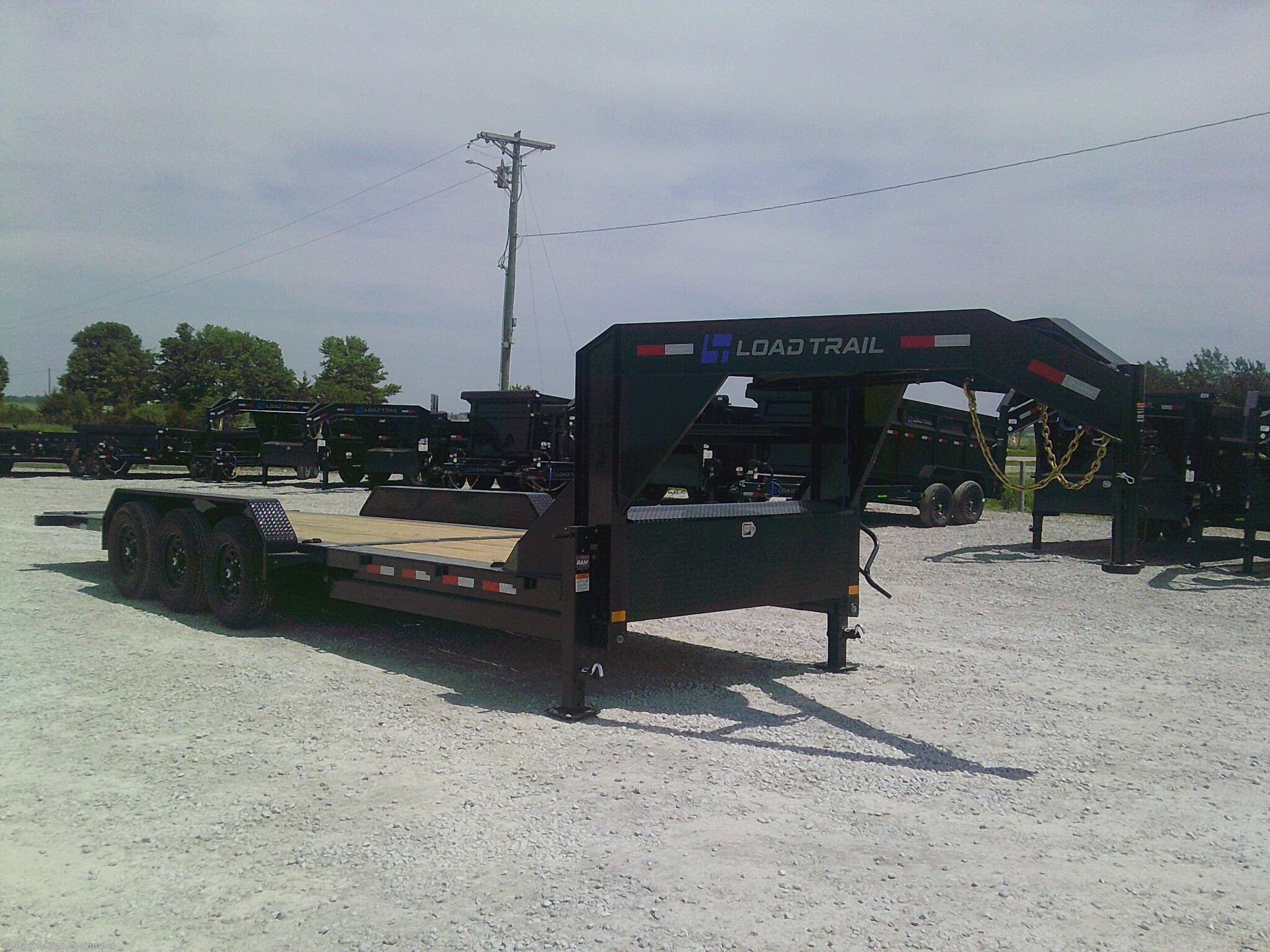 New 2026 Load Trail GN 83" X 24' Tilt-N-Go GN Triple Axle Tilt Deck 21K available in Urbana, Iowa