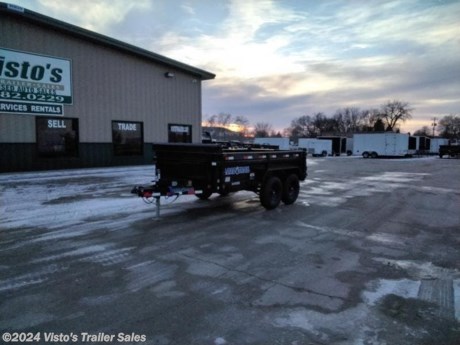Check out this New Load Trail 72&#39;&#39;X12&#39; Dump Trailer from Visto&#39;s Trailer Sales in West Fargo, ND. Stock # 310578

Standard Features:-2-5,200 Lb Dexter Spring Axles (2 Elec FSA Brakes)-ST235/80 R16 LRE 10 Ply. (BLACK WHEELS)-Coupler 2-5/16&quot; Adjustable (4 HOLE)-Diamond Plate Fenders (weld-on)-16&quot; Cross-Members-24&quot; Dump Sides w/24&quot; 2 Way Gate (10 Gauge Floor)-REAR Slide-IN Ramps 80&quot; x 16&quot;-Jack Drop Leg 7000 lb.-Lights LED (w/Cold Weather Harness)-4-D-Rings 4&quot; Weld On-Scissor Hoist w/Standard Pump-Standard Battery Wall Charger (5 Amp)

Upgrades Added:-Spare Tire Mount

*MAY BE SHOWN W/ OPTIONAL SPARE AND CARRIER*

Visto&#39;s Trailer Sales not only offers trailer sales and truck beds, but also provides parts and service support. We&#39;re here to provide you with full support for your trailer needs.

Don&#39;t forget to shop our Parts department or ask our expert sales team about recommendations or upgrades fit for your trailer, such as spare tires, mounts, toolboxes, and more. We&#39;re here to make your hauling experience easier and more efficient! 

Did you know we offer custom trailer design and ordering? Our trailer sales team will work with you to find the best option fit for your hauling needs. Give us a call at 701-282-0229 to speak with our sales team, or stop by our dealership in West Fargo, ND to see our trailer inventory in person.
