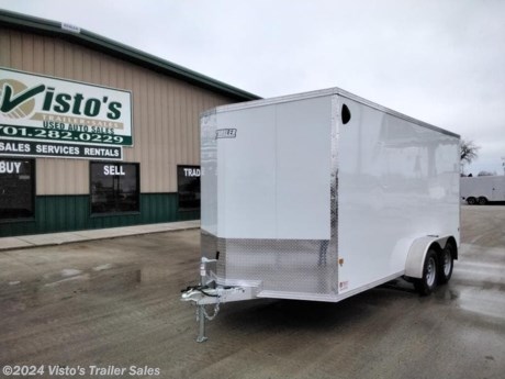 Check out this New EZ Hauler 7&#39;X16&#39; Enclosed Trailer from Visto&#39;s Trailer Sales in West Fargo, ND. Stock # 028017

Standard Features:-2-3,500lb Spring Axles-2&quot; Coupler-Screwless Exterior-32&quot; Side Door-Rear Ramp Door

Upgrades Added:-82&quot; Interior Height-Slant V-Nose-16&quot; OC Floor Studs

*MAY BE SHOWN W/ OPTIONAL SPARE AND CARRIER*

Visto&#39;s Trailer Sales not only offers trailer sales and truck beds, but also provides parts and service support. We&#39;re here to provide you with full support for your trailer needs.

Don&#39;t forget to shop our Parts department or ask our expert sales team about recommendations or upgrades fit for your trailer, such as spare tires, mounts, toolboxes, and more. We&#39;re here to make your hauling experience easier and more efficient! 

Did you know we offer custom trailer design and ordering? Our trailer sales team will work with you to find the best option fit for your hauling needs. Give us a call at 701-282-0229 to speak with our sales team, or stop by our dealership in West Fargo, ND to see our trailer inventory in person.
