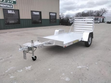Check out this New Aluma 54&quot;X10&#39; Utility Trailer from Visto&#39;s Trailer Sales in West Fargo, ND. Stock # 281413

Standard Features:-2000lb Torsion Axle-2&#39;&#39; Coupler-Aluminum Wheels-LED Lighting-Straight Tailgate-Swivel Tongue Jack-(4) Weld On Tie Loops

Upgrades Added:-12&quot; Stoneguard-12&quot; Solid Sides

*MAY BE SHOWN W/ OPTIONAL SPARE AND CARRIER*

Visto&#39;s Trailer Sales not only offers trailer sales and truck beds, but also provides parts and service support. We&#39;re here to provide you with full support for your trailer needs.

Don&#39;t forget to shop our Parts department or ask our expert sales team about recommendations or upgrades fit for your trailer, such as spare tires, mounts, toolboxes, and more. We&#39;re here to make your hauling experience easier and more efficient! 

Did you know we offer custom trailer design and ordering? Our trailer sales team will work with you to find the best option fit for your hauling needs. Give us a call at 701-282-0229 to speak with our sales team, or stop by our dealership in West Fargo, ND to see our trailer inventory in person.