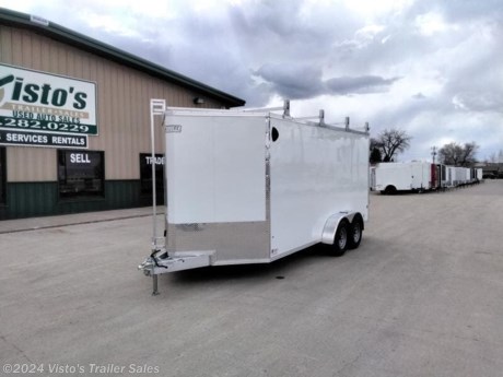 Check out this New EZ Hauler 7&#39;X16&#39; Enclosed Trailer from Visto&#39;s Trailer Sales in West Fargo, ND. Stock # 028450

Standard Features:-All-Aluminum Construction, Integrated Frame Design-36&quot; V-Nose Front-2&quot;x5&quot; Integrated Frame-16&quot; O/C Floor &amp; Roof Studs (All Box-Tube)-16&quot; O/C Wall Studs-Screwless .030 Bonded Sides-One Piece Aluminum Roof-Axles: 2-3K Braked Leaf Spring Axles w/4&quot; Drop-24&quot; Stone Guard-2-5/16&quot; Coupler w/Safety Chains-2000lb Center Jack w/Foot-3/8&quot; Water Resistant Interior Walls-3/4&quot; Water Resistant Decking-Interior Cove Trim-3&quot; Exterior Trim-(2) Dome Light w/Switch-Exterior LED Lighting-Plastic Salem Vents-79&quot; Interior Height

Upgrades Added:-Double Barn Doors w/Stowable Removable Ramp Kit-Aluminum Hardware for Barn Doors-Catwalk System w/(4) HD Ladder Racks-Front Ladder-Rear Roller for Last Ladder Rack

*MAY BE SHOWN W/ OPTIONAL SPARE AND CARRIER*

Visto&#39;s Trailer Sales not only offers trailer sales and truck beds, but also provides parts and service support. We&#39;re here to provide you with full support for your trailer needs.

Don&#39;t forget to shop our Parts department or ask our expert sales team about recommendations or upgrades fit for your trailer, such as spare tires, mounts, toolboxes, and more. We&#39;re here to make your hauling experience easier and more efficient! 

Did you know we offer custom trailer design and ordering? Our trailer sales team will work with you to find the best option fit for your hauling needs. Give us a call at 701-282-0229 to speak with our sales team, or stop by our dealership in West Fargo, ND to see our trailer inventory in person.