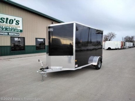Check out this New EZ Hauler 6&#39;X12&#39; Enclosed Trailer from Visto&#39;s Trailer Sales in West Fargo, ND. Stock #028451

Standard Features:-3,500lb Spring Axle-2&quot; Coupler-Screwless Exterior-32&quot; Side Door-Rear Ramp Door

Upgrades Added:-79&quot; Interior Height

*MAY BE SHOWN W/ OPTIONAL SPARE AND CARRIER*

Visto&#39;s Trailer Sales not only offers trailer sales and truck beds, but also provides parts and service support. We&#39;re here to provide you with full support for your trailer needs.

Don&#39;t forget to shop our Parts department or ask our expert sales team about recommendations or upgrades fit for your trailer, such as spare tires, mounts, toolboxes, and more. We&#39;re here to make your hauling experience easier and more efficient! 

Did you know we offer custom trailer design and ordering? Our trailer sales team will work with you to find the best option fit for your hauling needs. Give us a call at 701-282-0229 to speak with our sales team, or stop by our dealership in West Fargo, ND to see our trailer inventory in person.