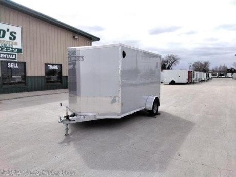 Check out this New EZ Hauler 6.5&#39;X12&#39; Enclosed Trailer from Visto&#39;s Trailer Sales in West Fargo, ND. Stock #027835

Standard Features:-2&quot; Coupler-Screwless Exterior-32&quot; Side Door-24&quot; V-Front-Rear Ramp Door-72&quot; Box Width-73&quot; Interior Height-2K Jack

Upgrades Added:-79&quot; Interior Height-V-Nose Slant

*MAY BE SHOWN W/ OPTIONAL SPARE AND CARRIER*

Visto&#39;s Trailer Sales not only offers trailer sales and truck beds, but also provides parts and service support. We&#39;re here to provide you with full support for your trailer needs.

Don&#39;t forget to shop our Parts department or ask our expert sales team about recommendations or upgrades fit for your trailer, such as spare tires, mounts, toolboxes, and more. We&#39;re here to make your hauling experience easier and more efficient! 

Did you know we offer custom trailer design and ordering? Our trailer sales team will work with you to find the best option fit for your hauling needs. Give us a call at 701-282-0229 to speak with our sales team, or stop by our dealership in West Fargo, ND to see our trailer inventory in person.