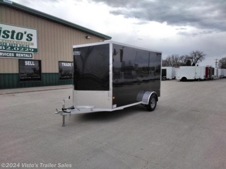 Check out this New EZ Hauler 6&#39;X12&#39; Enclosed Trailer from Visto&#39;s Trailer Sales in West Fargo, ND. Stock #028544

Standard Features:-3,500lb Spring Axle-2&quot; Coupler-Screwless Exterior-32&quot; Side Door-Rear Ramp Door

Upgrades Added:-79&quot; Interior Height-Slant Front

*MAY BE SHOWN W/ OPTIONAL SPARE AND CARRIER*

Visto&#39;s Trailer Sales not only offers trailer sales and truck beds, but also provides parts and service support. We&#39;re here to provide you with full support for your trailer needs.

Don&#39;t forget to shop our Parts department or ask our expert sales team about recommendations or upgrades fit for your trailer, such as spare tires, mounts, toolboxes, and more. We&#39;re here to make your hauling experience easier and more efficient! 

Did you know we offer custom trailer design and ordering? Our trailer sales team will work with you to find the best option fit for your hauling needs. Give us a call at 701-282-0229 to speak with our sales team, or stop by our dealership in West Fargo, ND to see our trailer inventory in person.