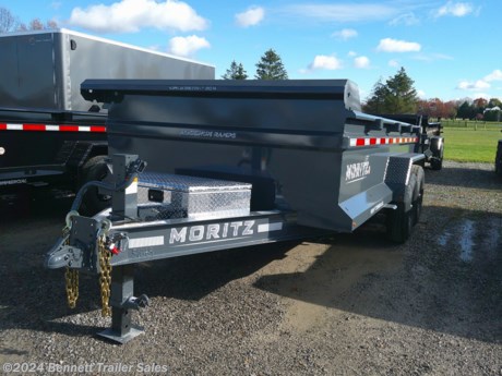 &lt;p&gt;&lt;span style=&quot;font-family: helvetica, arial, sans-serif;&quot;&gt;Standard Features on Moritz&#39;s Low Profile 14&#39; Dump:&lt;/span&gt;&lt;/p&gt;
&lt;ul&gt;
&lt;li&gt;&lt;span style=&quot;font-family: helvetica, arial, sans-serif;&quot;&gt;Torsion Axles&lt;/span&gt;&lt;/li&gt;
&lt;li&gt;&lt;span style=&quot;font-family: helvetica, arial, sans-serif;&quot;&gt;Electric Brakes, all Axles&lt;/span&gt;&lt;/li&gt;
&lt;li&gt;&lt;span style=&quot;font-family: helvetica, arial, sans-serif;&quot;&gt;Scissor Hoist&lt;/span&gt;&lt;/li&gt;
&lt;li&gt;&lt;span style=&quot;font-family: helvetica, arial, sans-serif;&quot;&gt;Locking Tongue Toolbox (houses battery &amp;amp; remote)&lt;/span&gt;&lt;/li&gt;
&lt;li&gt;&lt;span style=&quot;font-family: helvetica, arial, sans-serif;&quot;&gt;LED Lights&lt;/span&gt;&lt;/li&gt;
&lt;li&gt;&lt;span style=&quot;font-family: helvetica, arial, sans-serif;&quot;&gt;Adjustable Pintle Eye or 2-5/16&quot; Coupler&lt;/span&gt;&lt;/li&gt;
&lt;li&gt;&lt;span style=&quot;font-family: helvetica, arial, sans-serif;&quot;&gt;6&#39; Ramps&lt;/span&gt;&lt;/li&gt;
&lt;li&gt;&lt;span style=&quot;font-family: helvetica, arial, sans-serif;&quot;&gt;Combo Doors&lt;/span&gt;&lt;/li&gt;
&lt;li&gt;&lt;span style=&quot;font-family: helvetica, arial, sans-serif;&quot;&gt;10,000# Jack&lt;/span&gt;&lt;/li&gt;
&lt;li&gt;&lt;span style=&quot;font-family: helvetica, arial, sans-serif;&quot;&gt;D-Rings in Bed&lt;/span&gt;&lt;/li&gt;
&lt;/ul&gt;
&lt;p&gt;&lt;span style=&quot;font-family: helvetica, arial, sans-serif;&quot;&gt;This unit is equipped with the following options:&lt;/span&gt;&lt;/p&gt;
&lt;ul&gt;
&lt;li&gt;&lt;span style=&quot;font-family: helvetica, arial, sans-serif;&quot;&gt;Stake pockets&lt;/span&gt;&lt;/li&gt;
&lt;/ul&gt;
&lt;p&gt;&amp;nbsp;&lt;/p&gt;
&lt;p&gt;&amp;nbsp;&lt;/p&gt;
&lt;p&gt;&amp;nbsp;&lt;/p&gt;