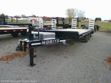 &lt;p&gt;&lt;span style=&quot;font-family: helvetica, arial, sans-serif;&quot;&gt;Standard Features for Moritz&#39;s UDC Series Flatbed Trailer:&lt;/span&gt;&lt;/p&gt;
&lt;ul&gt;
&lt;li&gt;&lt;span style=&quot;font-family: helvetica, arial, sans-serif;&quot;&gt;Torflex Axles&lt;/span&gt;&lt;/li&gt;
&lt;li&gt;&lt;span style=&quot;font-family: helvetica, arial, sans-serif;&quot;&gt;8&quot; I-Beam Main Frame&lt;/span&gt;&lt;/li&gt;
&lt;li&gt;&lt;span style=&quot;font-family: helvetica, arial, sans-serif;&quot;&gt;3&quot; Channel Cross Members&lt;/span&gt;&lt;/li&gt;
&lt;li&gt;&lt;span style=&quot;font-family: helvetica, arial, sans-serif;&quot;&gt;Treadplate over wheel wells for lower deck height&lt;/span&gt;&lt;/li&gt;
&lt;li&gt;&lt;span style=&quot;font-family: helvetica, arial, sans-serif;&quot;&gt;(2) 4&quot; Channel Aluminum Ramps&lt;/span&gt;&lt;/li&gt;
&lt;li&gt;&lt;span style=&quot;font-family: helvetica, arial, sans-serif;&quot;&gt;LED Lights&lt;/span&gt;&lt;/li&gt;
&lt;li&gt;&lt;span style=&quot;font-family: helvetica, arial, sans-serif;&quot;&gt;4&#39; Dovetail&lt;/span&gt;&lt;/li&gt;
&lt;li&gt;
&lt;div align=&quot;left&quot;&gt;&lt;span style=&quot;font-family: helvetica, arial, sans-serif;&quot;&gt;Adjustable Pintle Ring or 2-5/16 Coupler&lt;/span&gt;&lt;/div&gt;
&lt;/li&gt;
&lt;li&gt;&lt;span style=&quot;font-family: helvetica, arial, sans-serif;&quot;&gt;Tongue toolbox&lt;/span&gt;&lt;/li&gt;
&lt;li&gt;&lt;span style=&quot;font-family: helvetica, arial, sans-serif;&quot;&gt;Vertical (Stand-up) Ramp Bars&lt;/span&gt;&lt;/li&gt;
&lt;/ul&gt;
&lt;p&gt;&lt;span style=&quot;font-family: helvetica, arial, sans-serif;&quot;&gt;This unit is equipped with the following options:&lt;/span&gt;&lt;/p&gt;
&lt;ul&gt;
&lt;li&gt;&lt;span style=&quot;font-family: helvetica, arial, sans-serif;&quot;&gt;14 Ply Tires&lt;/span&gt;&lt;/li&gt;
&lt;/ul&gt;