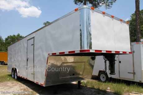 &lt;div&gt;NEW 8.5&#39; X 32&#39; ENCLOSED GOOSNECK CARGO TRAILER&lt;/div&gt;
&lt;div&gt;&amp;nbsp;&lt;/div&gt;
&lt;div&gt;Up for your Consideration is a Brand New Model 8.5&#39; X 24&#39;+8&#39; Riser Tandem Axle, Enclosed Gooseneck Cargo Trailer&lt;/div&gt;
&lt;div&gt;&amp;nbsp;&lt;/div&gt;
&lt;div&gt;ALL the TOP QUALITY FEATURES listed in this ad!&lt;/div&gt;
&lt;div&gt;&amp;nbsp;&lt;/div&gt;
&lt;div&gt;Standard ELITE SERIES Features:&lt;/div&gt;
&lt;div&gt;&amp;nbsp;&lt;/div&gt;
&lt;div&gt;- Heavy Duty 8&quot; I-Beam Main Frame&lt;/div&gt;
&lt;div&gt;- Heavy Duty Square Tubing Wall Studs &amp;amp; Roof Bows&lt;/div&gt;
&lt;div&gt;- 32&#39; Gooseneck, 24&#39; Box Space + 8&#39; Riser&lt;/div&gt;
&lt;div&gt;- 16&quot; On Center Walls&lt;/div&gt;
&lt;div&gt;- 16&quot; On Center Floors&lt;/div&gt;
&lt;div&gt;- 16&quot; On Center Roof Bows&lt;/div&gt;
&lt;div&gt;- (2) 5,200 lb &quot;Dexter&quot; TORSION Axles w/ All Wheel Electric Brakes &amp;amp; EZ LUBE Grease&amp;nbsp; Fittings&lt;/div&gt;
&lt;div&gt;- Rear Spring Assisted Ramp Door with (2) Barlocks for Security, EZ Lube Hinge Pins, &amp;amp; 16&quot; Transitional Ramp Flap&lt;/div&gt;
&lt;div&gt;- 4&#39; No-Show Beaver Tail (Dove Tail)&lt;/div&gt;
&lt;div&gt;- 4 - 5,000 lb Flush Floor Mounted D-Rings&lt;/div&gt;
&lt;div&gt;- 36&quot; Side Door with RV Flush Lock &amp;amp; Bar Lock&lt;/div&gt;
&lt;div&gt;- ATP Diamond Plate Recessed Step-Up @ Side door&lt;/div&gt;
&lt;div&gt;- 81&quot; Interior Height inside box space (35 1/2&quot; in riser)&lt;/div&gt;
&lt;div&gt;- Galvalume Roof with Thermo Ply and Full Luan Ceiling Liner&lt;/div&gt;
&lt;div&gt;- 2 5/16&quot; Gooseneck Coupler&lt;/div&gt;
&lt;div&gt;- Heavy Duty Safety Chains&lt;/div&gt;
&lt;div&gt;- Electric Landing Gear&lt;/div&gt;
&lt;div&gt;- Roof mounted Solar Panel&lt;/div&gt;
&lt;div&gt;- Marine Battery&lt;/div&gt;
&lt;div&gt;- 7-Way Round RV Electrical Wiring Harness w/ Battery Back-Up &amp;amp; Safety Switch&lt;/div&gt;
&lt;div&gt;- Built In Cabinets &amp;amp; Steps Combo at Riser&lt;/div&gt;
&lt;div&gt;- ATP Bottom Trim on Sides &amp;amp; Rear&lt;/div&gt;
&lt;div&gt;- ATP Front under riser with Keyed Lock Access Door w/ Easy Access Junction Box&lt;/div&gt;
&lt;div&gt;- Exterior L.E.D. Lighting Package&lt;/div&gt;
&lt;div&gt;- DOT Reflective Tape&lt;/div&gt;
&lt;div&gt;- 3/8&quot; Heavy Duty Grade Plywood Walls&lt;/div&gt;
&lt;div&gt;- 3/4&quot; Heavy Duty Grade Plywood Floors&lt;/div&gt;
&lt;div&gt;- Heavy Duty Smooth Fender Flares&amp;nbsp;&lt;/div&gt;
&lt;div&gt;- Deluxe License Plate Holder&lt;/div&gt;
&lt;div&gt;- Top Quality Exterior Grade Paint&lt;/div&gt;
&lt;div&gt;- (2) Non-Powered Interior Roof Vent&lt;/div&gt;
&lt;div&gt;- (2) 12 Volt Interior Trailer Light w/ Wall Switch&lt;/div&gt;
&lt;div&gt;- Smooth Polished Aluminum Front &amp;amp; Rear Corners&lt;/div&gt;
&lt;div&gt;- 15&quot; Radial (ST22575R15) Tires &amp;amp; Wheels&lt;/div&gt;
&lt;div&gt;&amp;nbsp;&lt;/div&gt;
&lt;div&gt;Shown in Standard color White, Other colors and trim options are available just ask and we will list them on eBay!&lt;/div&gt;
&lt;div&gt;&amp;nbsp;&lt;/div&gt;
&lt;div&gt;*Trailer Shown with optional trim*&lt;/div&gt;
&lt;div&gt;&amp;nbsp;&lt;/div&gt;
&lt;div&gt;*All trailers are D.O.T. Compliant for all 50 States, Canada, &amp;amp; Mexico.&lt;/div&gt;
&lt;div&gt;&amp;nbsp;&lt;/div&gt;
&lt;div&gt;*Manufacturers Title and 5 Year Limited Warranty Included&lt;/div&gt;
&lt;div&gt;&amp;nbsp;&lt;/div&gt;
&lt;div&gt;*FINANCING IS AVAILABLE W/ APPROVED CREDIT&lt;/div&gt;
&lt;div&gt;&amp;nbsp;&lt;/div&gt;
&lt;div&gt;ASK US ABOUT OUR RENT TO OWN PROGRAM - NO CREDIT CHECK - LOW DOWN PAYMENT&lt;/div&gt;
&lt;div&gt;&amp;nbsp;&lt;/div&gt;
&lt;div&gt;*Trailer is offered @ factory direct pricing...We also have a Florida pick up location in Tampa and We offer Nationwide Delivery (See Shipping for more Information)&lt;/div&gt;
&lt;div&gt;&amp;nbsp;&lt;/div&gt;
&lt;div&gt;*FOR MORE INFORMATION CALL:&lt;/div&gt;
&lt;div&gt;&amp;nbsp;&lt;/div&gt;
&lt;div&gt;888-710-2112&lt;/div&gt;
&lt;div&gt;&amp;nbsp;&lt;/div&gt;
&lt;p&gt;&amp;nbsp;&lt;/p&gt;
