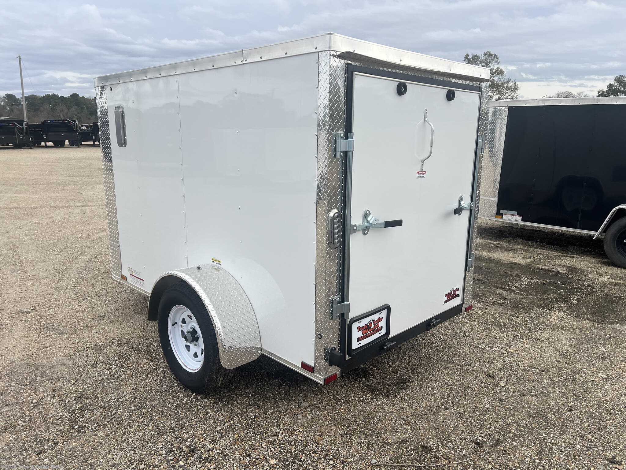 2024 5' x 8' Single Axle Enclosed by Arising from Truck & Trailer World in Denham Springs, Louisiana