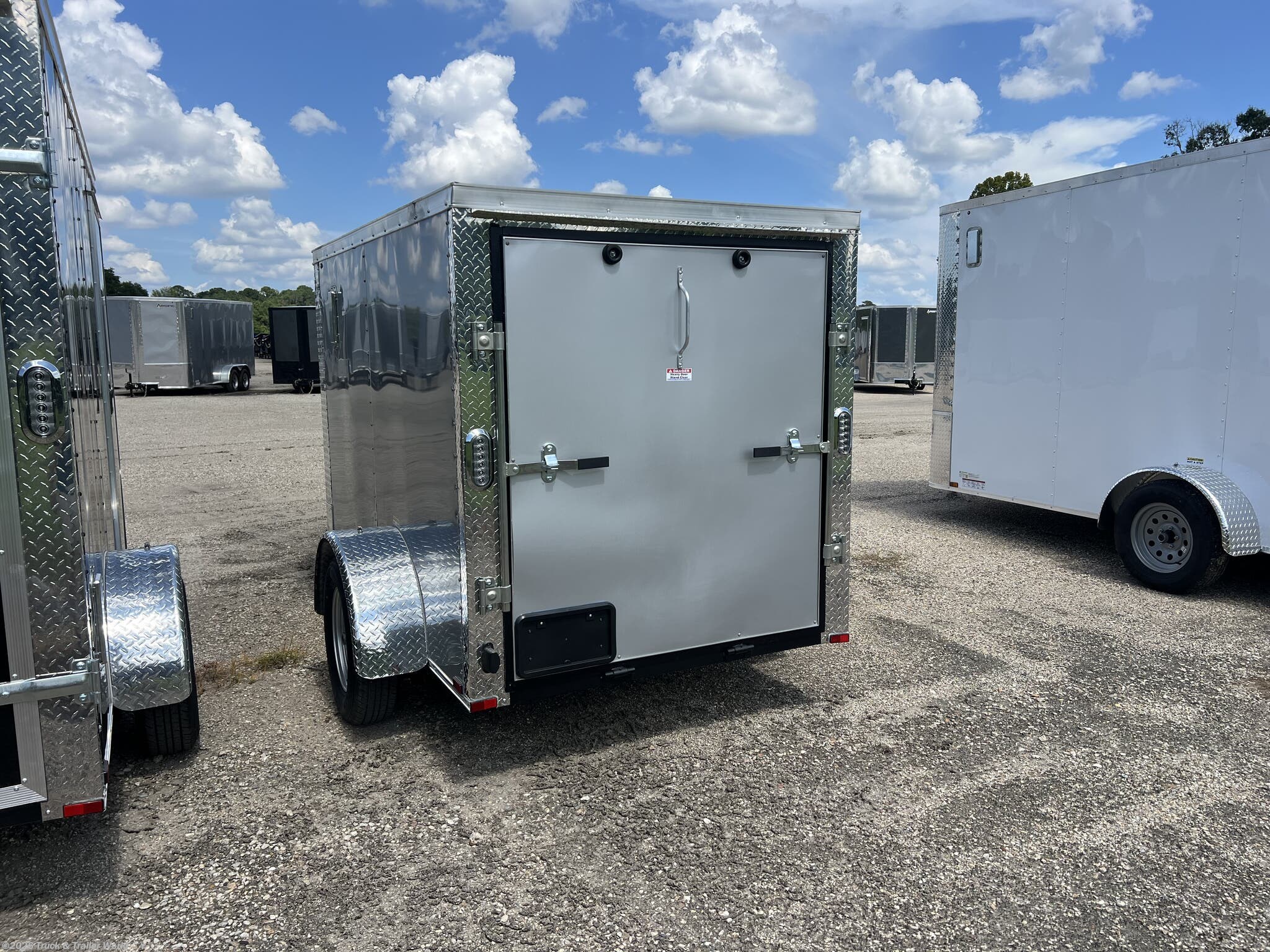 2025 5' x 8' Single Axle Enclosed by Arising from Truck & Trailer World in Denham Springs, Louisiana