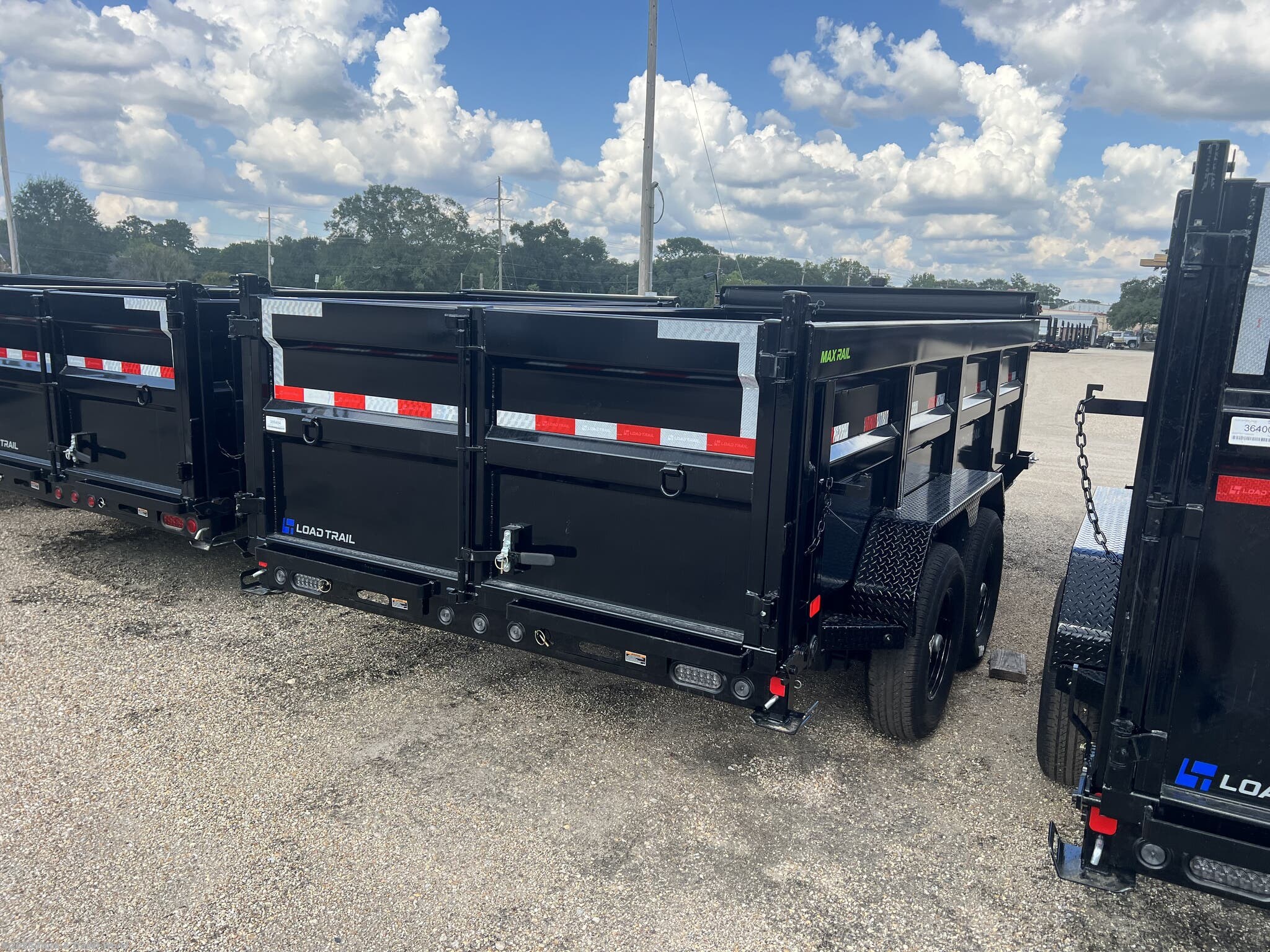 2026 DL 83" x 14' Tandem Axle Dump Low-Pro Dump Trailer by Load Trail from Truck & Trailer World in Denham Springs, Louisiana