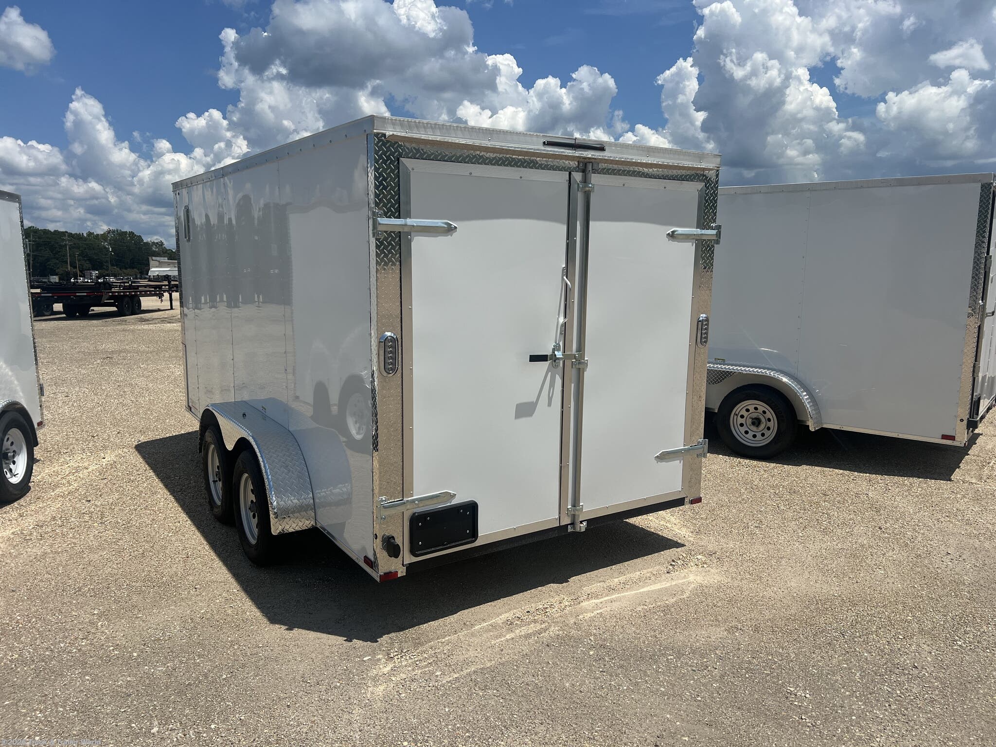 2026 CH 83" x 20' Tandem Axle Carhauler Trailer by Load Trail from Truck & Trailer World in Denham Springs, Louisiana