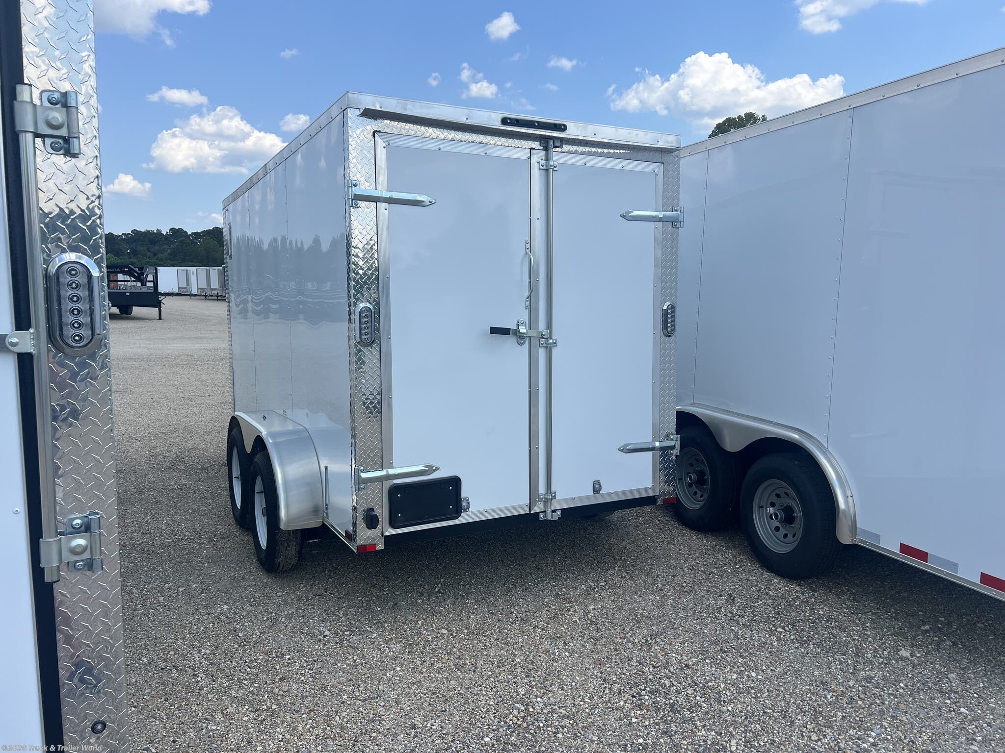 2026 6' x 12' Tandem Axle Enclosed by Arising from Truck & Trailer World in Denham Springs, Louisiana