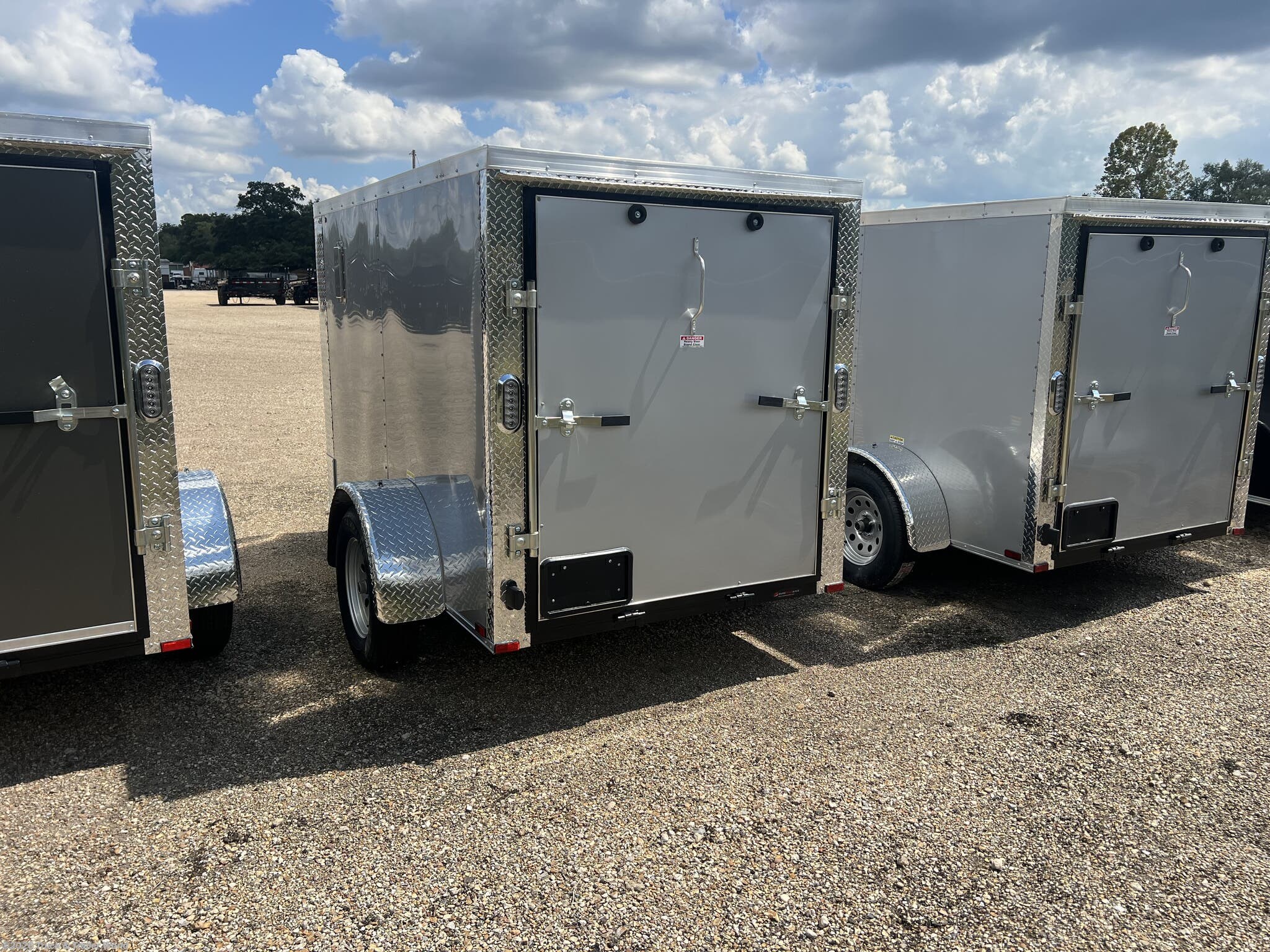 2026 5' x 8' Single Axle Enclosed by Arising from Truck & Trailer World in Denham Springs, Louisiana