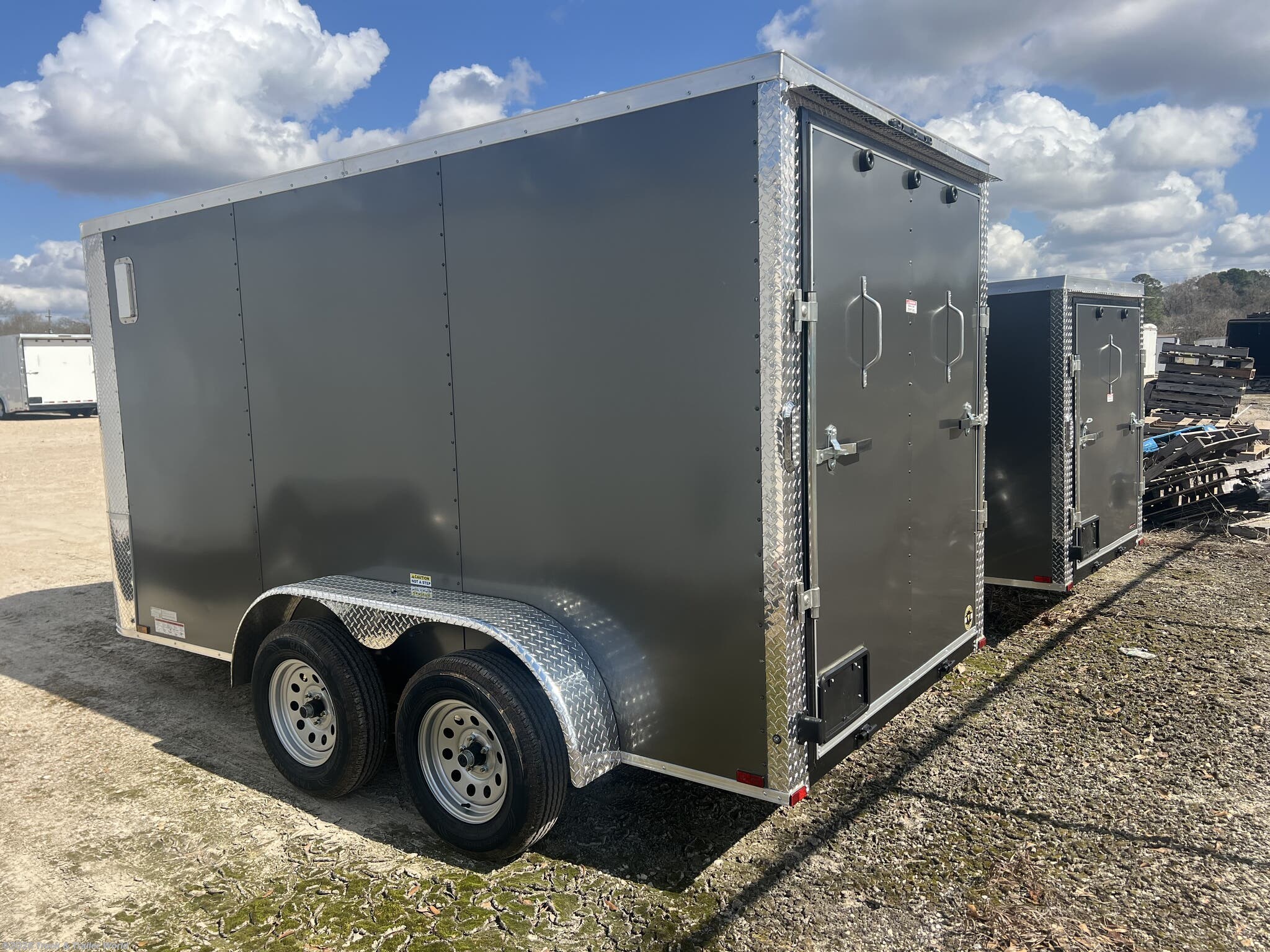 2025 6' x 12' Tandem Axle Enclosed by Arising from Truck & Trailer World in Denham Springs, Louisiana