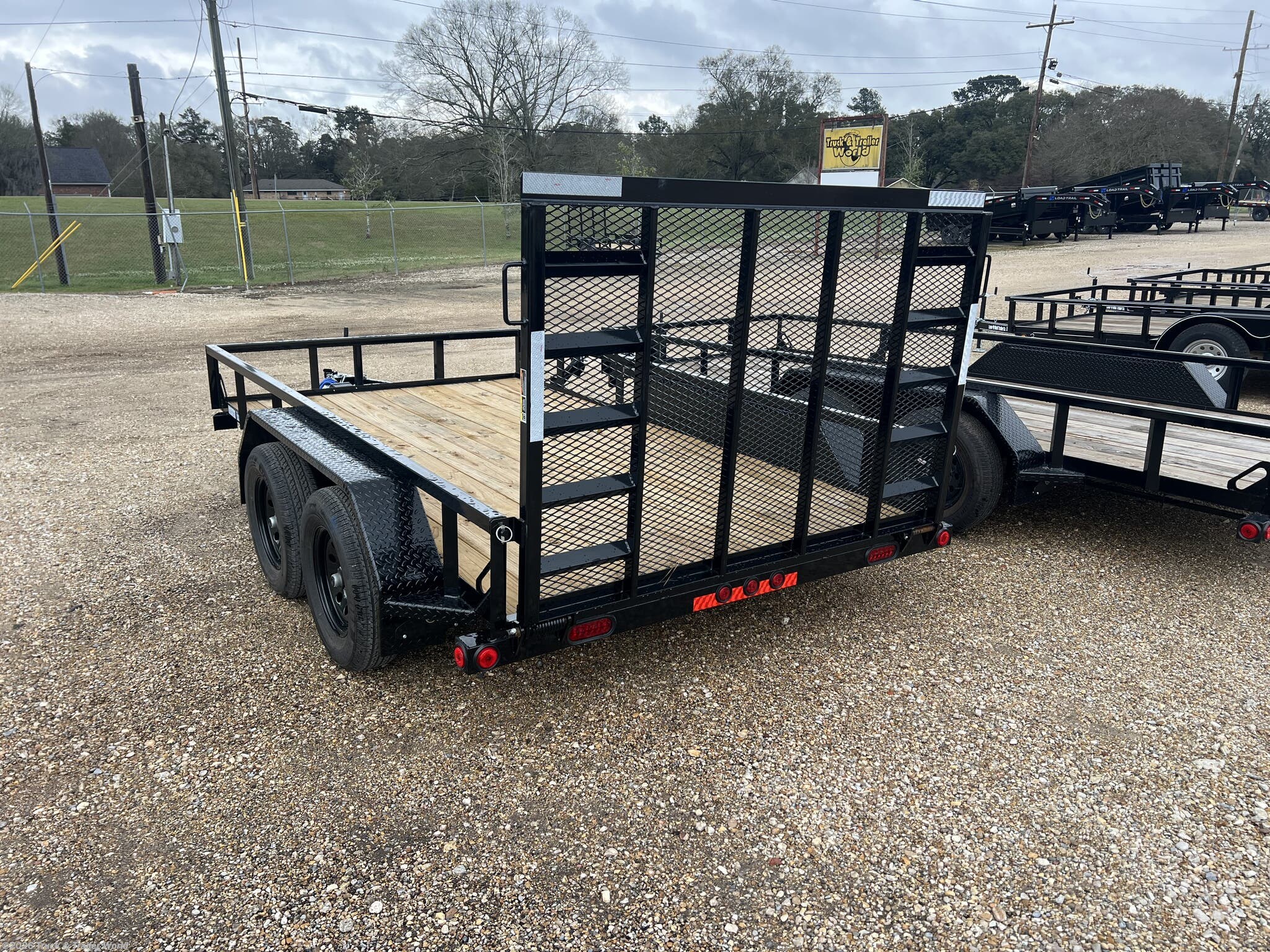 2026 UE 77" x 12' Tandem Axle Utility Trailer by Load Trail from Truck & Trailer World in Denham Springs, Louisiana