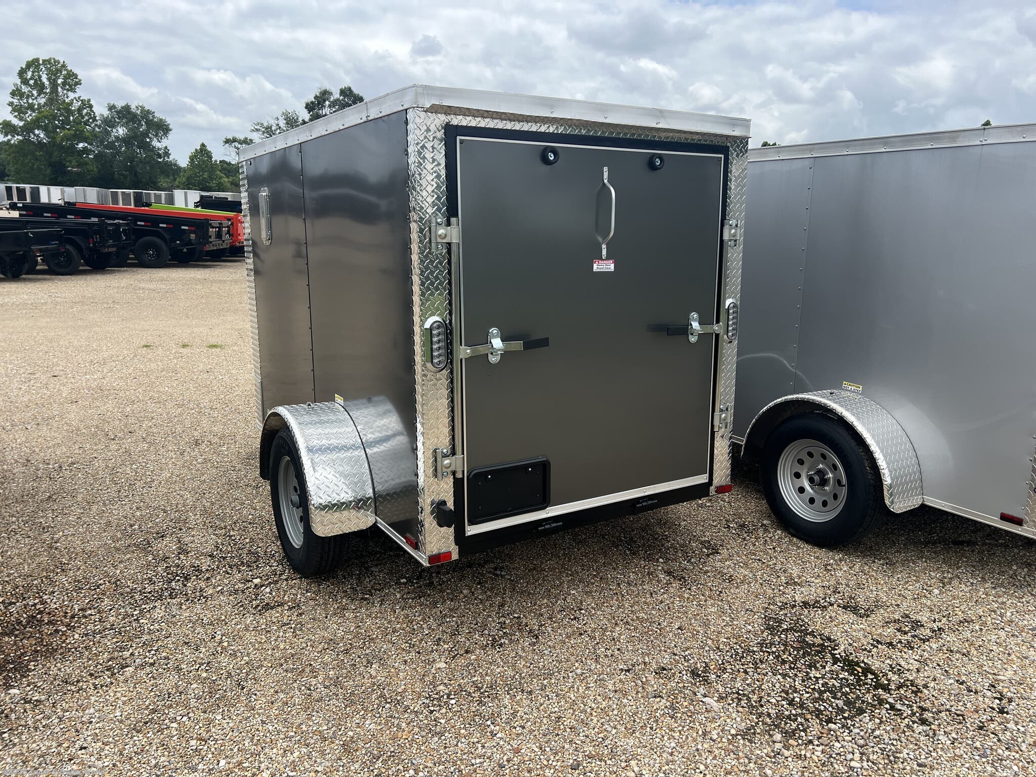 2026 5' x 8' Single Axle Enclosed by Arising from Truck & Trailer World in Denham Springs, Louisiana
