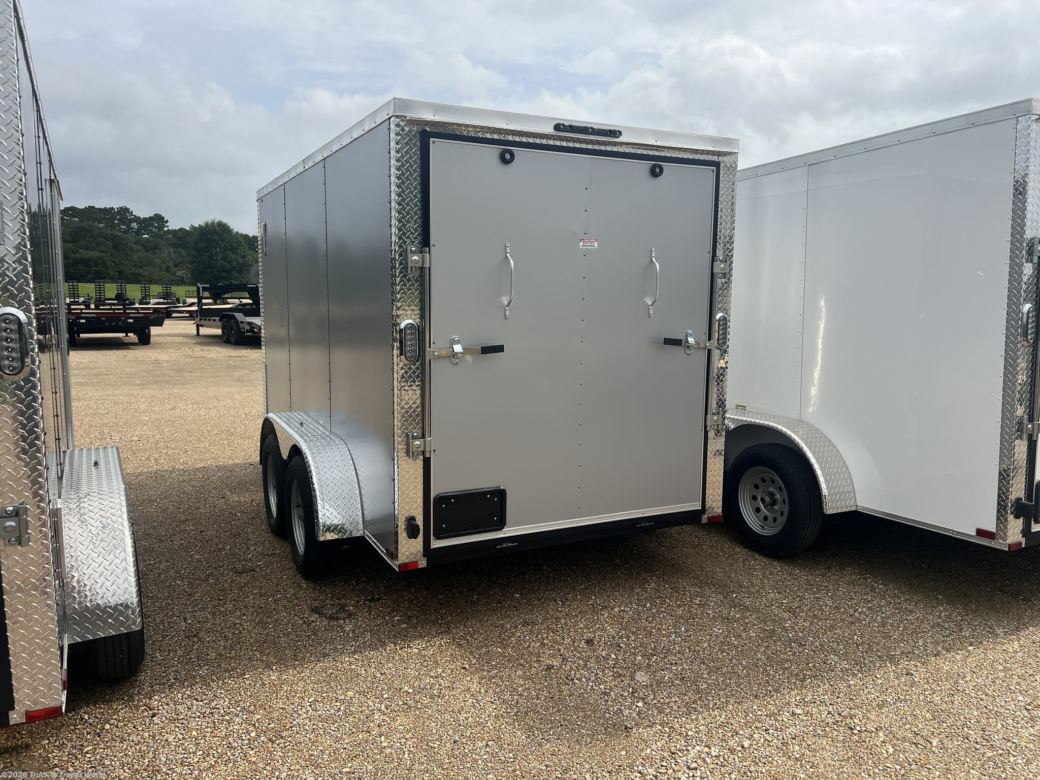 2025 6' x 12' Tandem Axle Enclosed by Arising from Truck & Trailer World in Denham Springs, Louisiana