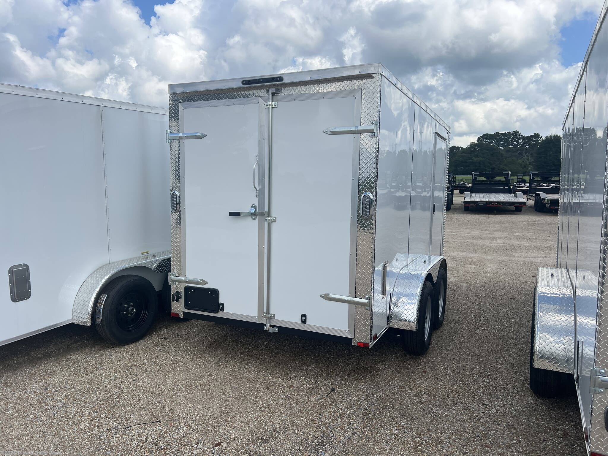 2025 6' x 12' Tandem Axle Enclosed by Arising from Truck & Trailer World in Denham Springs, Louisiana