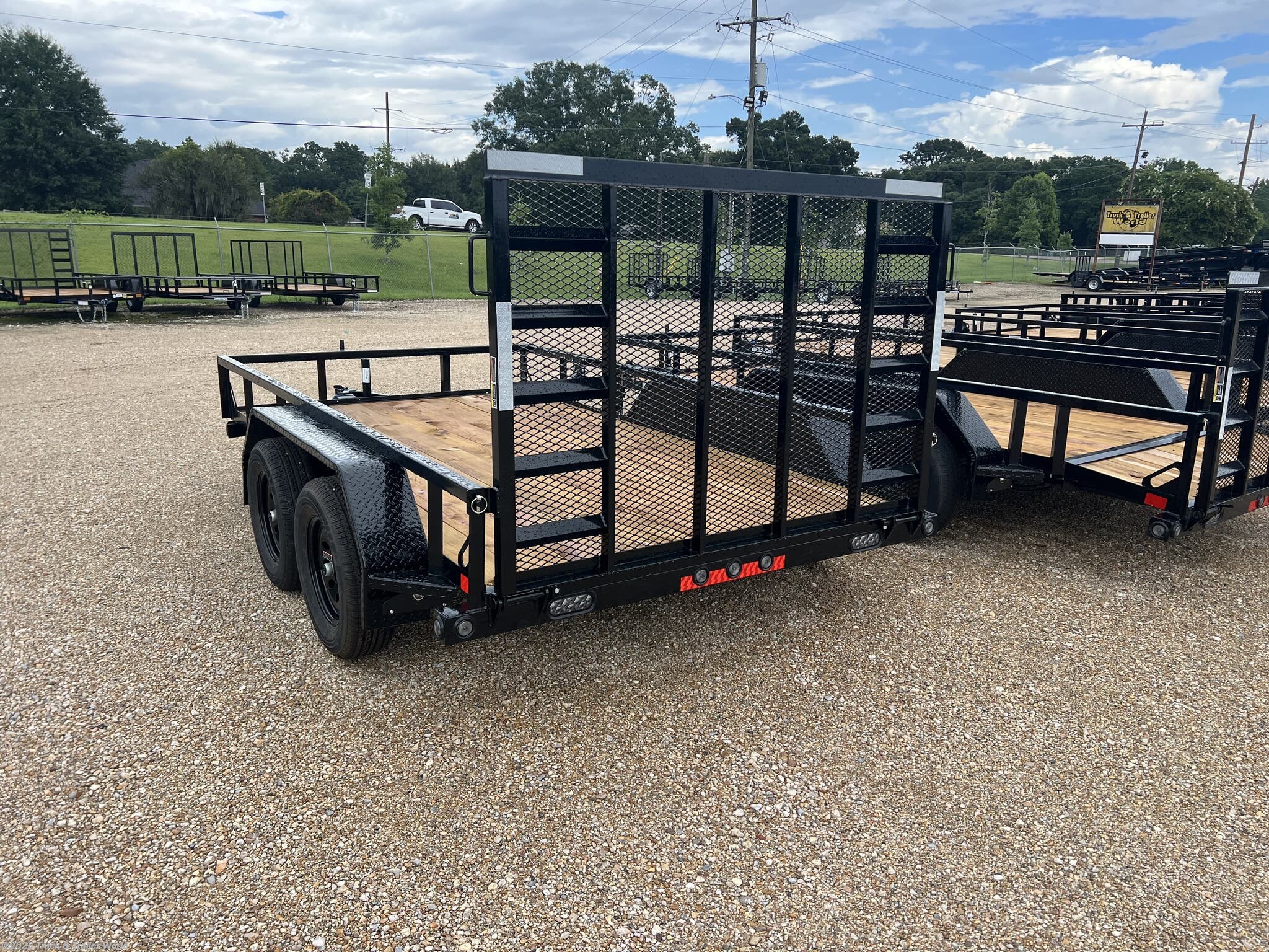 2026 UE 77" x 12' Tandem Axle Utility Trailer by Load Trail from Truck & Trailer World in Denham Springs, Louisiana