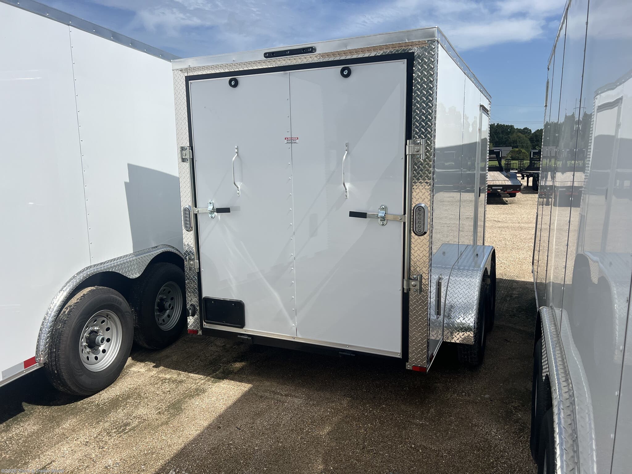 2026 6' x 12' Tandem Axle Enclosed by Arising from Truck & Trailer World in Denham Springs, Louisiana