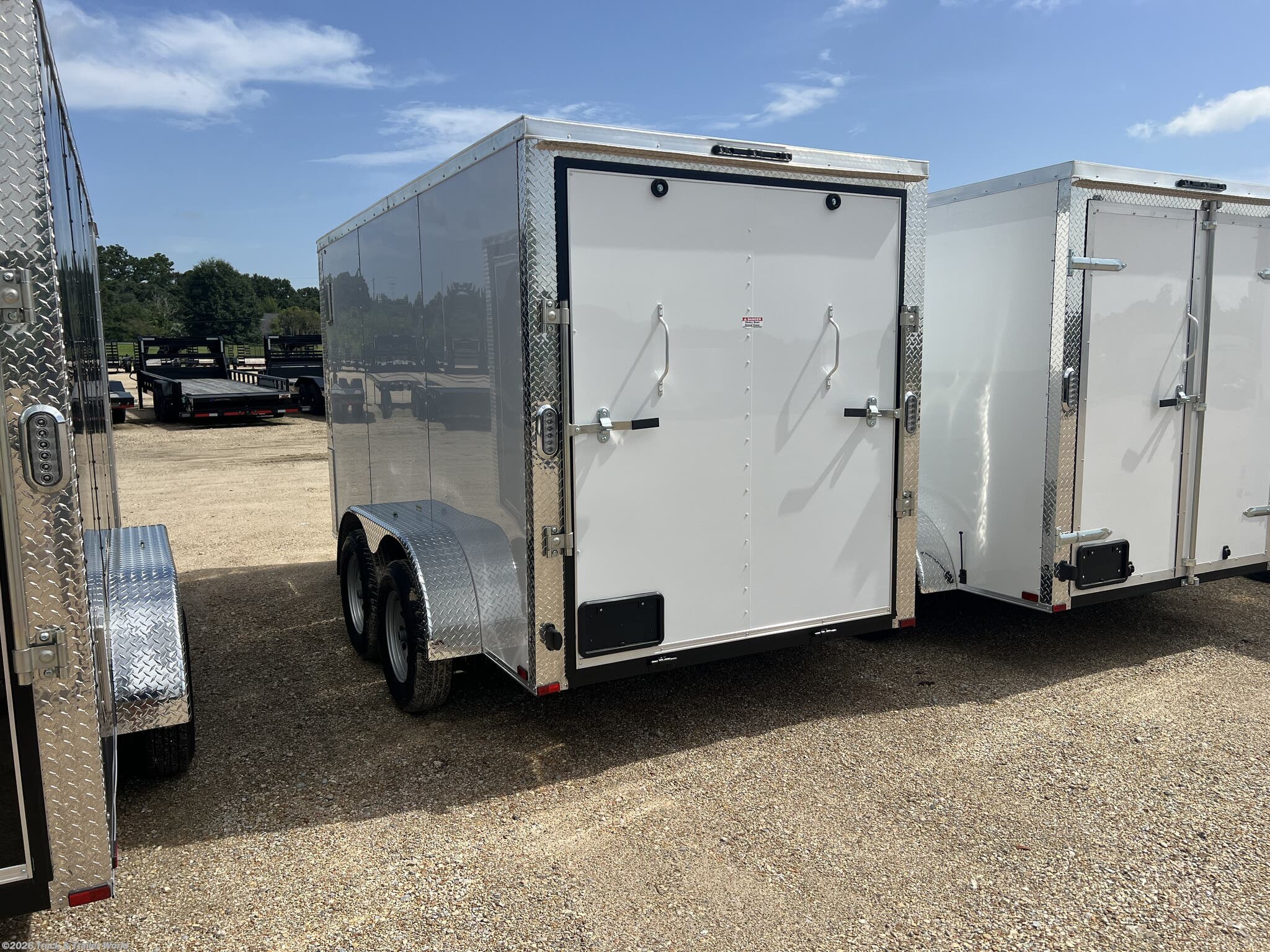 2026 6' x 12' Tandem Axle Enclosed by Arising from Truck & Trailer World in Denham Springs, Louisiana