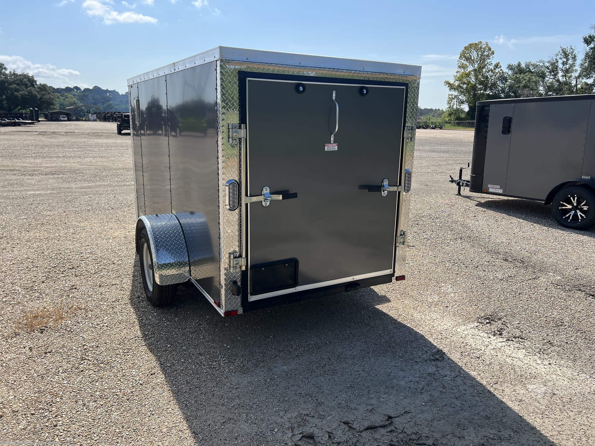 2026 5' x 10' Single Axle Enclosed by Arising from Truck & Trailer World in Denham Springs, Louisiana