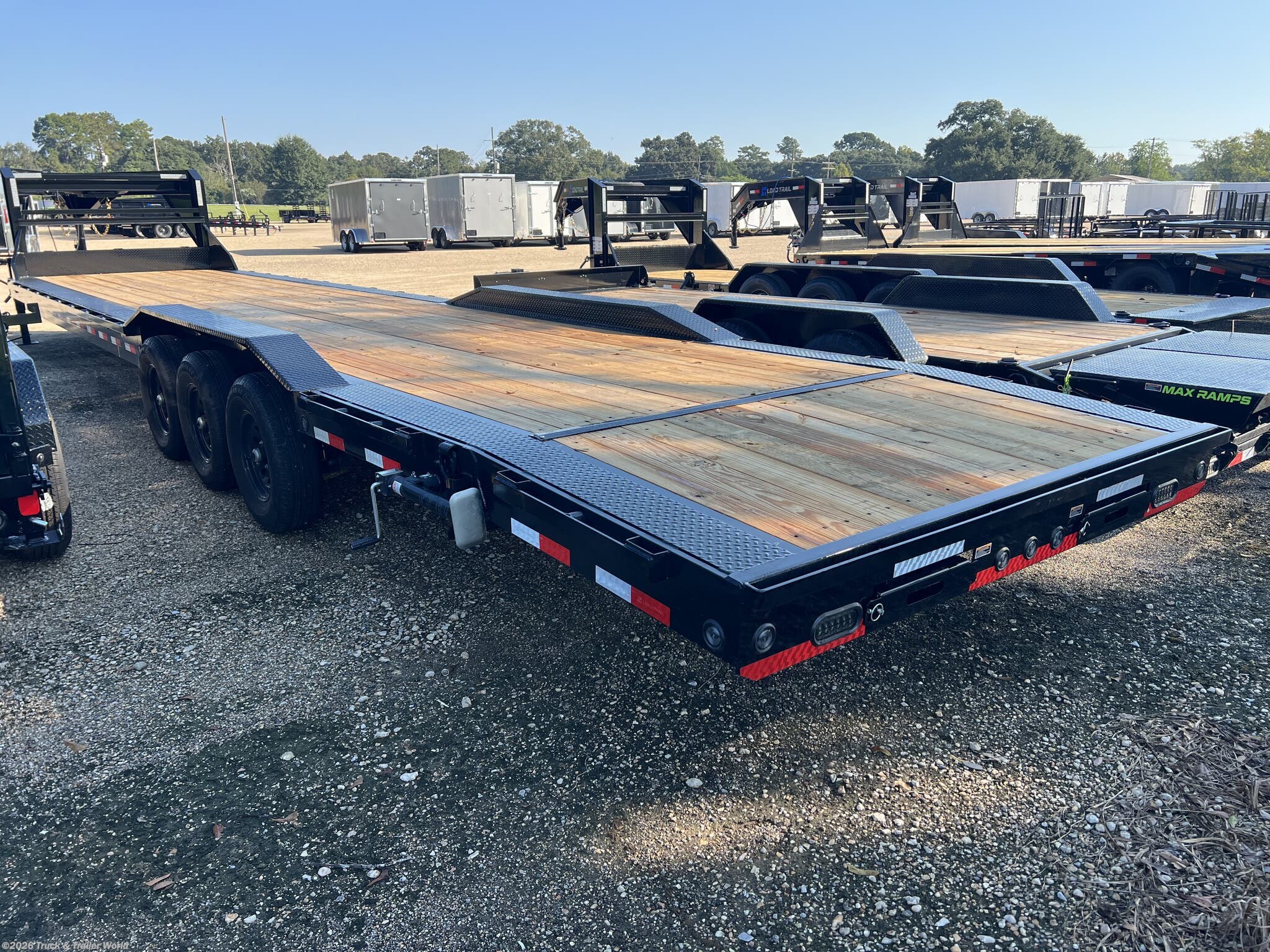2027 GC 102" x 40' Triple  Gooseneck Carhauler by Load Trail from Truck & Trailer World in Denham Springs, Louisiana