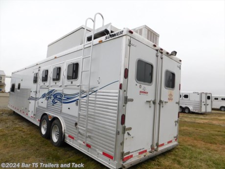 
&lt;div&gt;Lots of room in this trailer with a 17&#39; short wall. Fully enclosed front keeps tanks and dual electric jacks clean and functioning! Tons of storage, and brand new never lube bearing hubs. Fully serviced and ready to go!!&lt;/div&gt;
&lt;div&gt;&lt;span style=&quot;font-weight: bold;&quot;&gt;Living Quarters - 17&#39;&lt;/span&gt;&lt;/div&gt;
&lt;div&gt;- Air conditioner&amp;nbsp;&lt;/div&gt;
&lt;div&gt;- Furnace&amp;nbsp;&lt;/div&gt;
&lt;div&gt;- Built in gas generator&amp;nbsp;&lt;/div&gt;
&lt;div&gt;- Dinette&amp;nbsp;&lt;/div&gt;
&lt;div&gt;- Sofa&lt;/div&gt;
&lt;div&gt;- Microwave&amp;nbsp;&lt;/div&gt;
&lt;div&gt;- Two burner stove top&lt;/div&gt;
&lt;div&gt;- Double sink&lt;/div&gt;
&lt;div&gt;- 6.0 CU.FT. Fridge w/freezer&lt;/div&gt;
&lt;div&gt;- Neo Angle Large Shower&lt;/div&gt;
&lt;div&gt;- Toilet&lt;/div&gt;
&lt;div&gt;- Bathroom Sink&lt;/div&gt;
&lt;div&gt;- Two TV&#39;s&lt;/div&gt;
&lt;div&gt;- Radio/CD player&lt;/div&gt;
&lt;div&gt;- Cabinets&amp;nbsp;&lt;/div&gt;
&lt;div&gt;&lt;span style=&quot;font-weight: bold;&quot;&gt;Horse Trailer&amp;nbsp;&lt;/span&gt;&lt;/div&gt;
&lt;div&gt;- 4 horse&lt;/div&gt;
&lt;div&gt;- Dividers with Stud Divider first stall&lt;/div&gt;
&lt;div&gt;- Escape door&lt;/div&gt;
&lt;div&gt;- Rear tack folding&lt;/div&gt;
&lt;div&gt;- Butt bar&lt;/div&gt;
&lt;div&gt;- Chest bar&lt;/div&gt;
&lt;div&gt;- Mangers with exterior access doors&lt;/div&gt;
&lt;div&gt;- Smoked Glass Sliding windows on butt side&lt;/div&gt;
&lt;div&gt;- LED lighting&lt;/div&gt;
&lt;div&gt;- Haypod with lid and ladder&lt;/div&gt;
&lt;div&gt;- Drop down windows w/face guards&lt;/div&gt;
&lt;div&gt;- Fully Insulated&lt;/div&gt;
&lt;div&gt;&lt;br /&gt;
	&lt;/div&gt;&lt;br /&gt;
 