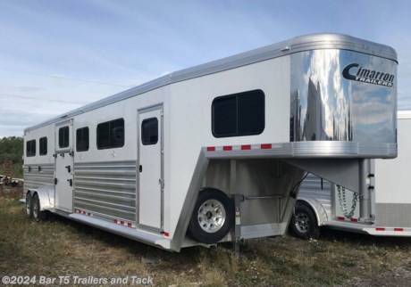 
&lt;p&gt;&lt;span style=&quot;font-family: Arial, Helvetica, sans-serif; font-size: 16px;&quot;&gt;HEAD TO HEAD&amp;nbsp;GN, THE&lt;span style=&quot;font-weight: bold;&quot;&gt; ULTIMATE&lt;/span&gt; IN HAULING LARGE HORSES!!&amp;nbsp;&lt;br /&gt;
		&lt;span style=&quot;font-weight: bold; font-size: 16px;&quot;&gt;&lt;br /&gt;
			Standard Features&amp;nbsp;&lt;/span&gt;&lt;br /&gt;
		- (2) 7000# Rubber torsion axles with ultralube hubs 4 Wheel electric brakes&amp;nbsp;&lt;br /&gt;
		- (5) 235/75R17.5 Load Range&quot;H&quot; radial tires &lt;br /&gt;
		- 8 Bolt Aluminum Spoke wheels,&amp;nbsp;2 5/16&quot; coupler w/adjustable height stem&lt;br /&gt;
		- Safety chains with hooks&amp;nbsp;&lt;br /&gt;
		- Two Speed Drop-leg GN jack, removable handle/lug wrench&amp;nbsp;&lt;br /&gt;
		- All aluminum construction&lt;br /&gt;
		- Fully insulated roof, 1/2&quot; thick fiberglass reinforced structural panel with R3 thermal value; The ultimate in temperature control&amp;nbsp;&lt;br /&gt;
		- Extruded aluminum interlocking V Truss floor Cross members at 4&quot; centers&amp;nbsp;&lt;br /&gt;
		- GN Tapered nose w/18&quot; radius corners for efficient aerodynamics&amp;nbsp;&lt;br /&gt;
		- Double Wall Extruded aluminum side walls on stall area w/.050 white aluminum above, fully insulated&lt;br /&gt;
		- Polished stainless steel front nose sheet&lt;br /&gt;
		- Door hold backs on all doors/gates&amp;nbsp;&lt;br /&gt;
		- Removable divider per two stalls with extruded head partition, solid aluminum chest and butt bars, fully padded&amp;nbsp;&lt;br /&gt;
		- (2) Solid front swing gates with bars above - Box Stall compatible&lt;br /&gt;
		- Triple wall construction with 1 3/8&quot;&amp;nbsp;styrofoam insulation, .090 kick plate, &amp;amp; rubber wallmat to bottom of window&amp;nbsp;&lt;br /&gt;
		- Single rear ramp door (54&quot;tall) with aluminum cam latches &amp;amp; top curtain doors&amp;nbsp;&lt;br /&gt;
		- Smoked glass sliding windows&amp;nbsp;&lt;br /&gt;
		- 4 Two-way aluminum flip-up roof vents, one per stall &lt;br /&gt;
		- 8 interior &amp;amp; 8 exterior tie rings&amp;nbsp;&lt;br /&gt;
		- (5) Recessed LED dome lights with remote switch&amp;nbsp;&lt;br /&gt;
		- Removable VET type full length floor mats&amp;nbsp;&lt;br /&gt;
		- 60&quot; Side ramp door w/top curtains RH side&lt;br /&gt;
		- Escape door LH side&lt;br /&gt;
		- Awning LED Light on rear,&amp;nbsp;16&quot; Awning LED Light on RH&lt;br /&gt;
		&lt;strong style=&quot;&quot;&gt;&lt;br /&gt;
			Dressing Room Dimensions: 4&#39;L straight wall&amp;nbsp;&lt;/strong&gt;&lt;br /&gt;
		- Entry door, 32&quot; wide with dead bolt lock &amp;amp; sliding window (15&quot; x 22&quot;)&amp;nbsp;&lt;br /&gt;
		- Sliding window (19&quot; x 34&quot;) on each side of gooseneck&amp;nbsp;&lt;br /&gt;
		-&amp;nbsp; Carpeted floor, breastplate and bunk nose floor&amp;nbsp;&lt;br /&gt;
		- LED Recessed seal beam dome light w/remote switch &lt;br /&gt;
		- 12 J-hooks&lt;br /&gt;
		- 2 Blanket poles&lt;br /&gt;
		- Brush tray&lt;br /&gt;
		- Clothes bar&lt;br /&gt;
		- Adjustable 4 tier saddle rack on recessed post&lt;/span&gt;&lt;br /&gt;
	&lt;/p&gt; 