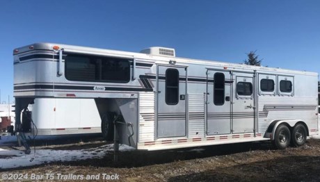 Very well maintained trailer with low use!&amp;nbsp;&lt;br /&gt;
&lt;br /&gt;
&lt;span style=&quot;font-weight: bold;&quot;&gt;Standard Features&lt;/span&gt;&lt;br /&gt;
- Ramp&lt;br /&gt;
- Collapsible rear tack&lt;br /&gt;
- Fold down feed doors&lt;br /&gt;
- Bus windows at buttside&amp;nbsp;&lt;br /&gt;
- A/C&lt;br /&gt;
- Mid-tack&amp;nbsp;&lt;br /&gt;
- Extra bridle hooks&lt;br /&gt;
- Water tank&lt;br /&gt;
- Electric pump&lt;br /&gt;
- 12v battery&lt;br /&gt;
- Sink&lt;br /&gt;
- Cupboard&amp;nbsp;&lt;br /&gt;
- Mattress&lt;br /&gt;
- Carpeted&amp;nbsp;&lt;br /&gt;
- Camper door w/ window&amp;nbsp;&lt;br /&gt;
- 2 speed jack&lt;br /&gt;
- Mats&lt;br /&gt;
- Kick wall mat&lt;br /&gt;
- Padded dividers&amp;nbsp;&lt;br /&gt;
- Rubber bumper&lt;br /&gt;
- New breaking plates&lt;br /&gt;
- New brakes&lt;br /&gt;
- Bearings re-packed&amp;nbsp;&lt;br /&gt;
 