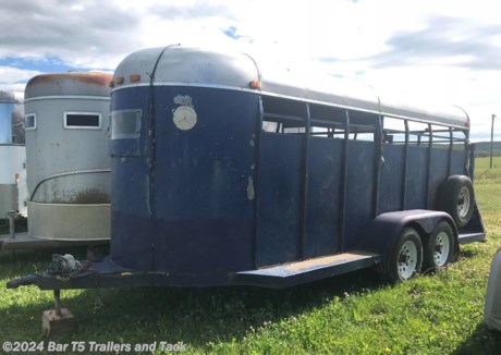&lt;span style=&quot;font-family: Arial, Helvetica, sans-serif; font-size: 16px;&quot;&gt;This trailer sells as is. It is a mechanics special. The electrical does not work.&amp;nbsp;&lt;br /&gt;
	&lt;br /&gt;
	&lt;span style=&quot;font-weight: bold; font-size: 16px;&quot;&gt;Standard Features&lt;/span&gt;&lt;br /&gt;
	- (2) 5200LB axles&amp;nbsp;&lt;br /&gt;
	- Full rear swing door&amp;nbsp;&lt;br /&gt;
	- Center gate&amp;nbsp;&lt;br /&gt;
	- Escape door&amp;nbsp;&lt;br /&gt;
	- Good tires&lt;br /&gt;
	- Spare tire&amp;nbsp;&lt;br /&gt;
	&lt;/span&gt;&lt;br /&gt;
&lt;br /&gt;
 
