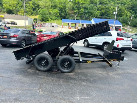 Convenient little dump trailer! This 6x12 low-side Doolittle dump trailer features 7,000 lb capacity, dual lift cylinders, mounted ramps, rear barn doors, and LED lighting! This is a quality built piece. Stop and check it out and compare to others. 