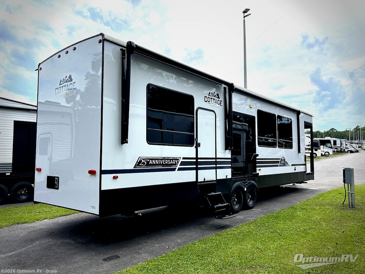 2024 Forest River Cedar Creek Cottage 40CFD - New Destination Trailer For Sale by Optimum RV - Ocala in Ocala, Florida features Slideout, Awning
