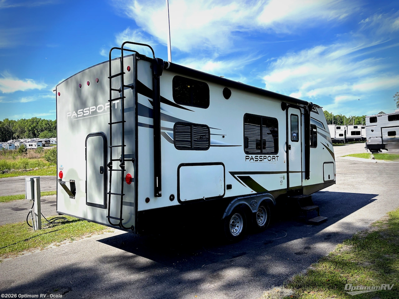 2021 Keystone Passport SL 219BH - Used Travel Trailer For Sale by Optimum RV - Ocala in Ocala, Florida features Awning