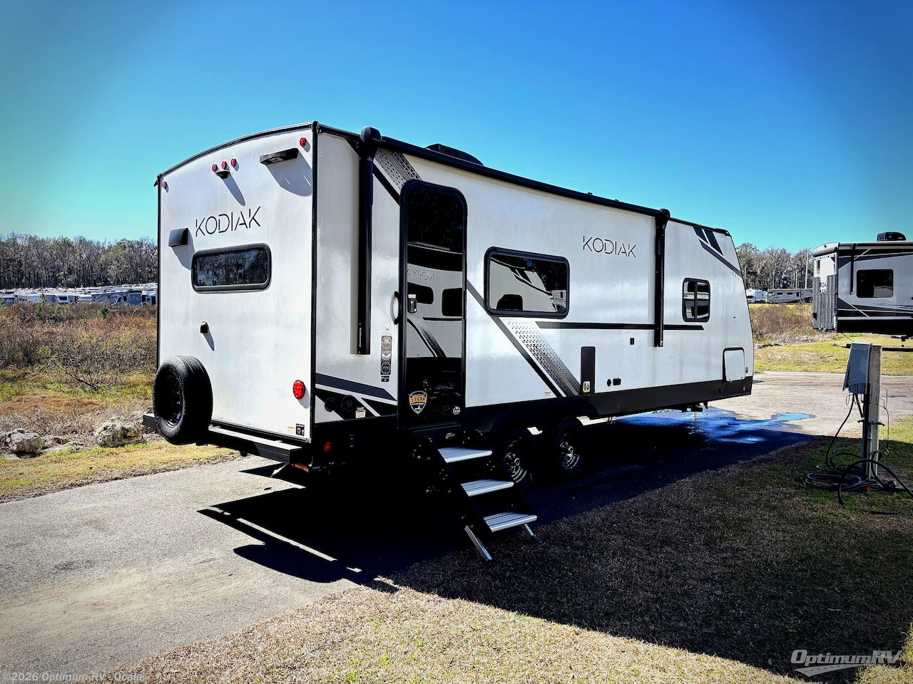 2025 Dutchmen Kodiak Ultra-Lite 241BHSL - New Travel Trailer For Sale by Optimum RV - Ocala in Ocala, Florida features Slideout, Awning