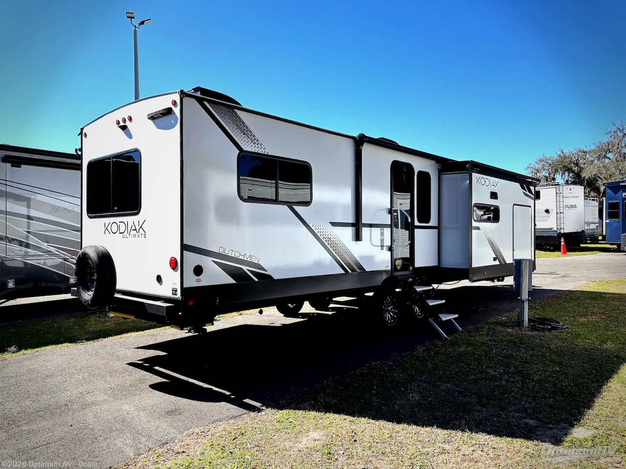 2025 Dutchmen Kodiak Ultimate 3371FLSL - New Travel Trailer For Sale by Optimum RV - Ocala in Ocala, Florida features Awning, Slideout