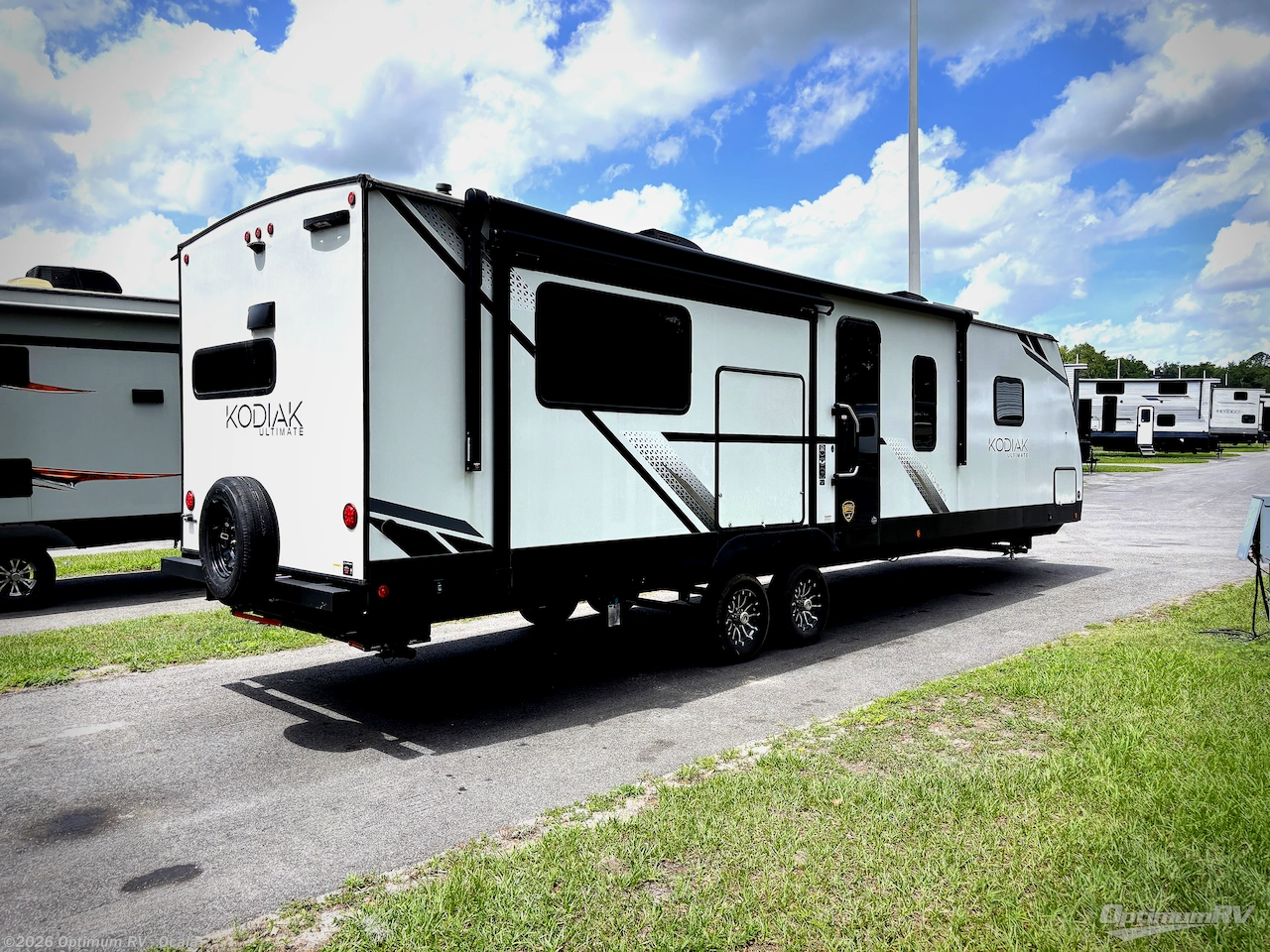 2025 Dutchmen Kodiak Ultimate 3361RKSL - New Travel Trailer For Sale by Optimum RV - Ocala in Ocala, Florida features Awning, Slideout