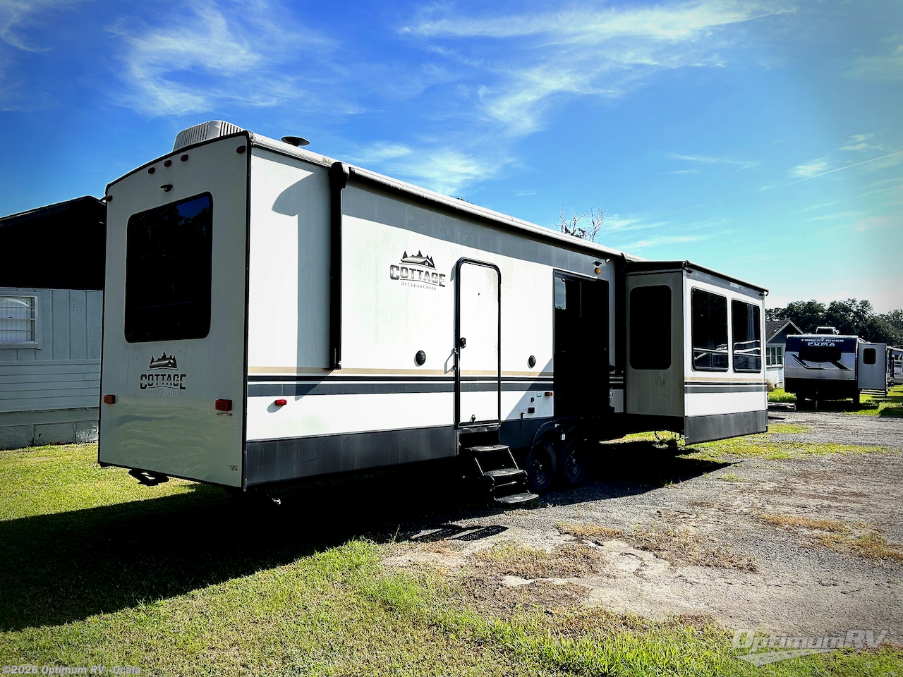2021 Forest River Cedar Creek Cottage 40CFK2 - Used Destination Trailer For Sale by Optimum RV - Ocala in Ocala, Florida features Slideout, Awning