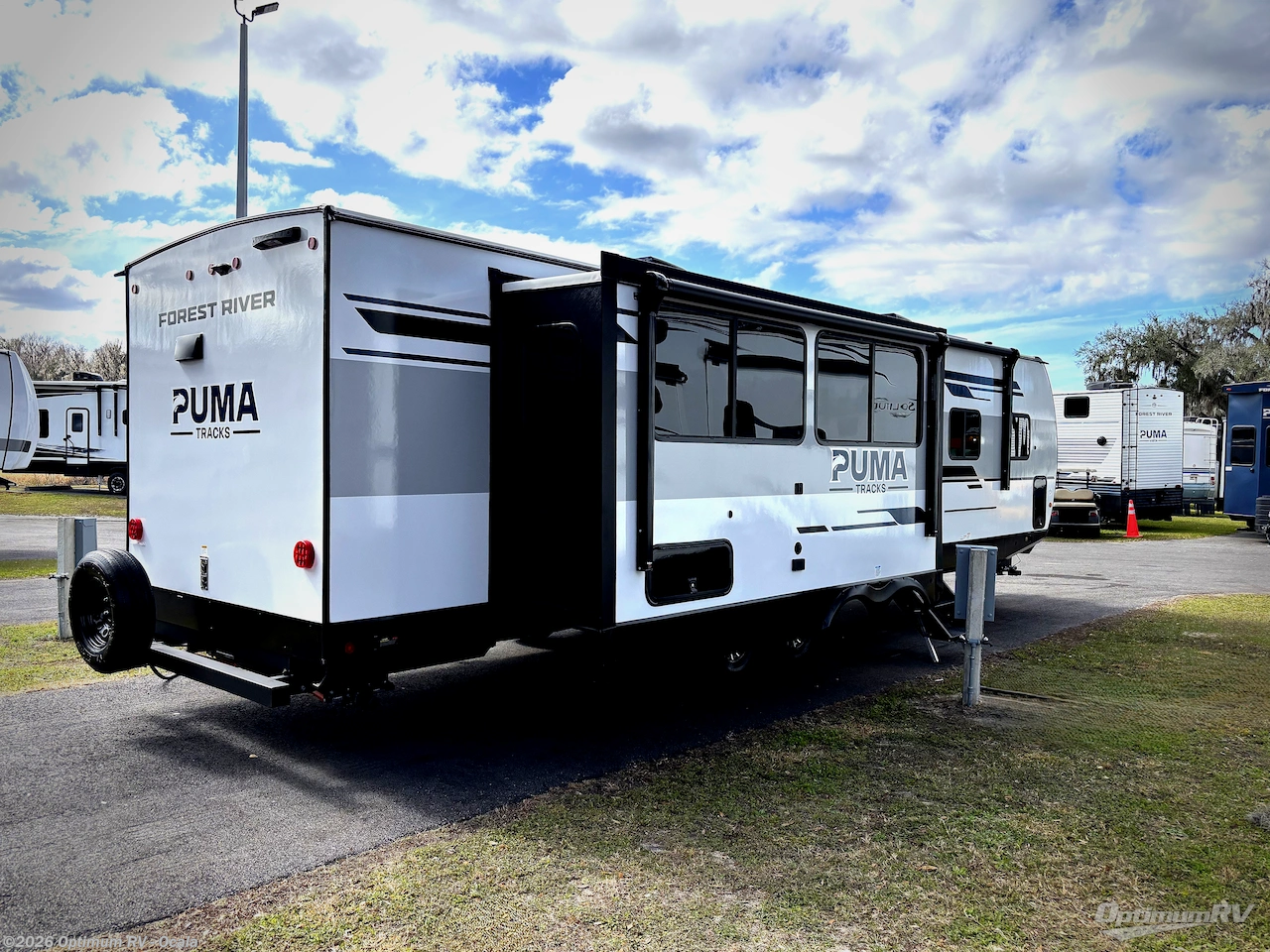2026 Forest River Puma Tracks 3060RKTS - New Travel Trailer For Sale by Optimum RV - Ocala in Ocala, Florida features Slideout, Awning