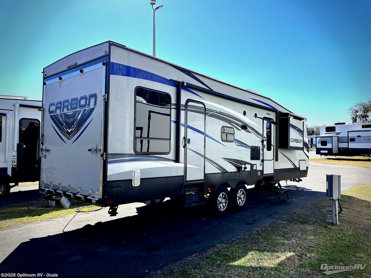 2016 Keystone Carbon 31 - Used Travel Trailer For Sale by Optimum RV - Ocala in Ocala, Florida features Slideout