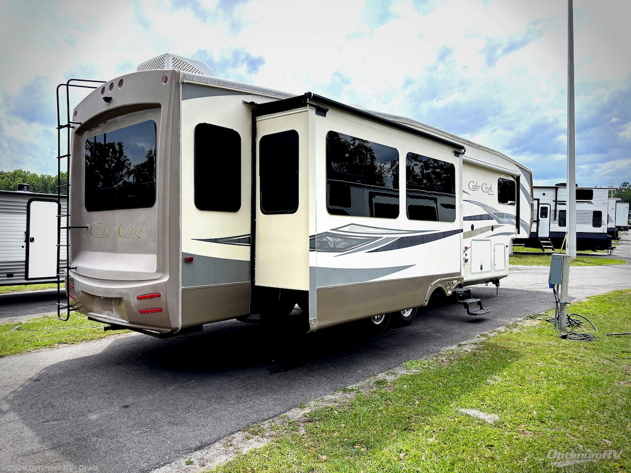 2015 Forest River Cedar Creek 36CKTS - Used Fifth Wheel For Sale by Optimum RV - Ocala in Ocala, Florida features Slideout
