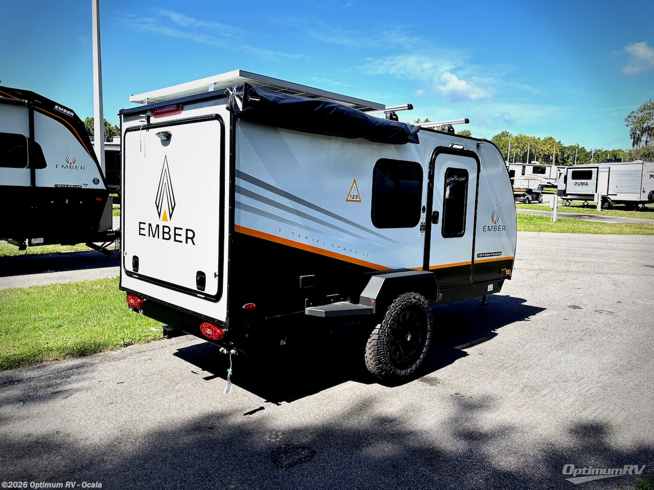 2026 Ember RV E-Series 12RK - New Travel Trailer For Sale by Optimum RV - Ocala in Ocala, Florida features Awning