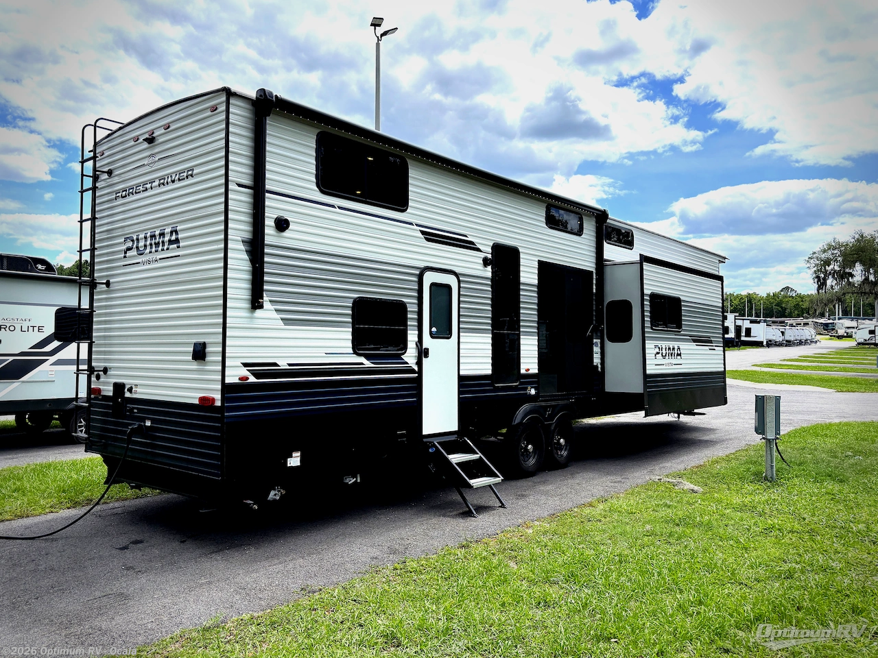 2027 Forest River Puma Vista 403LFT - New Destination Trailer For Sale by Optimum RV - Ocala in Ocala, Florida features Awning, Slideout
