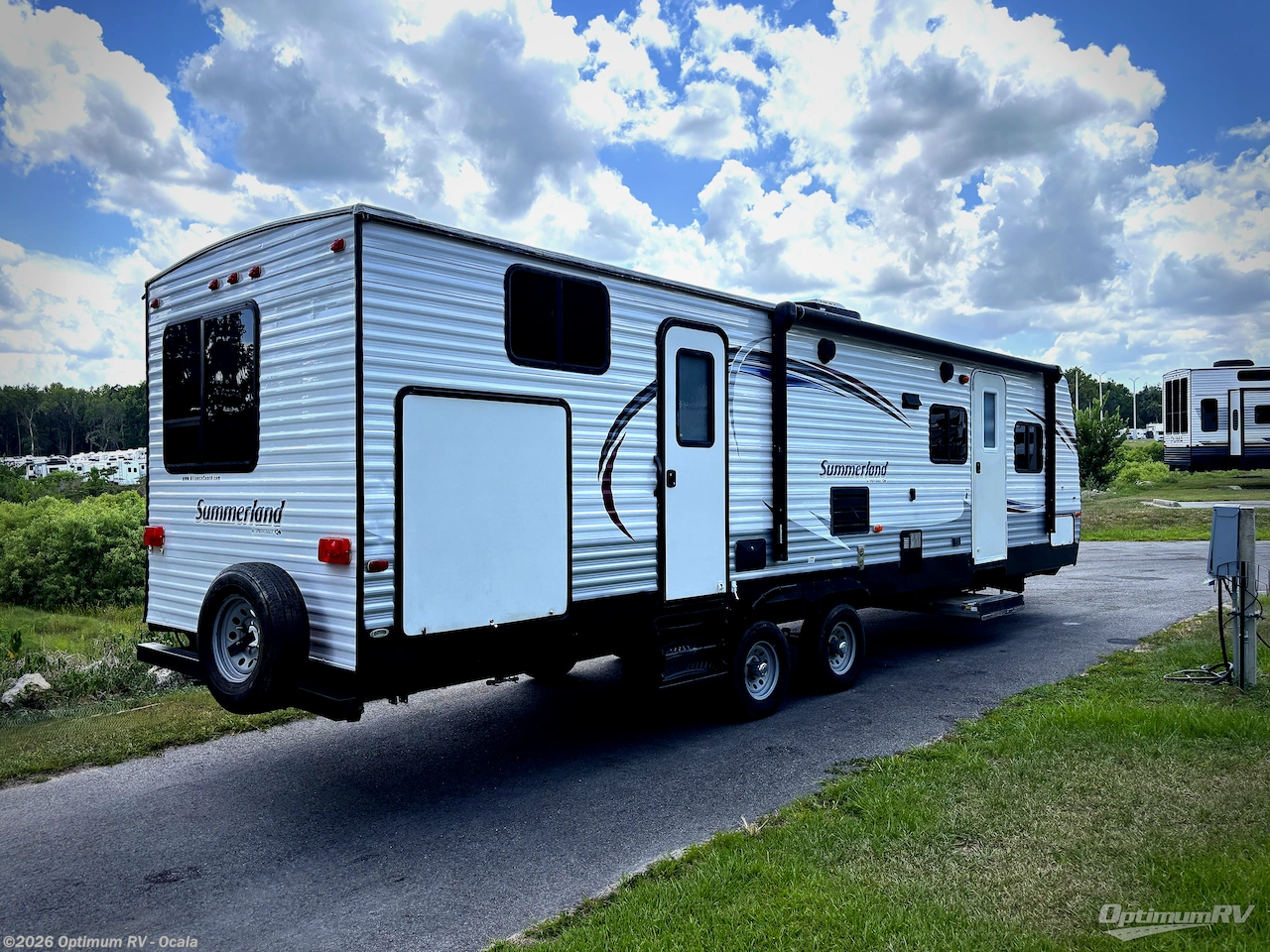 2016 Keystone Summerland 3030BH - Used Travel Trailer For Sale by Optimum RV - Ocala in Ocala, Florida features Slideout