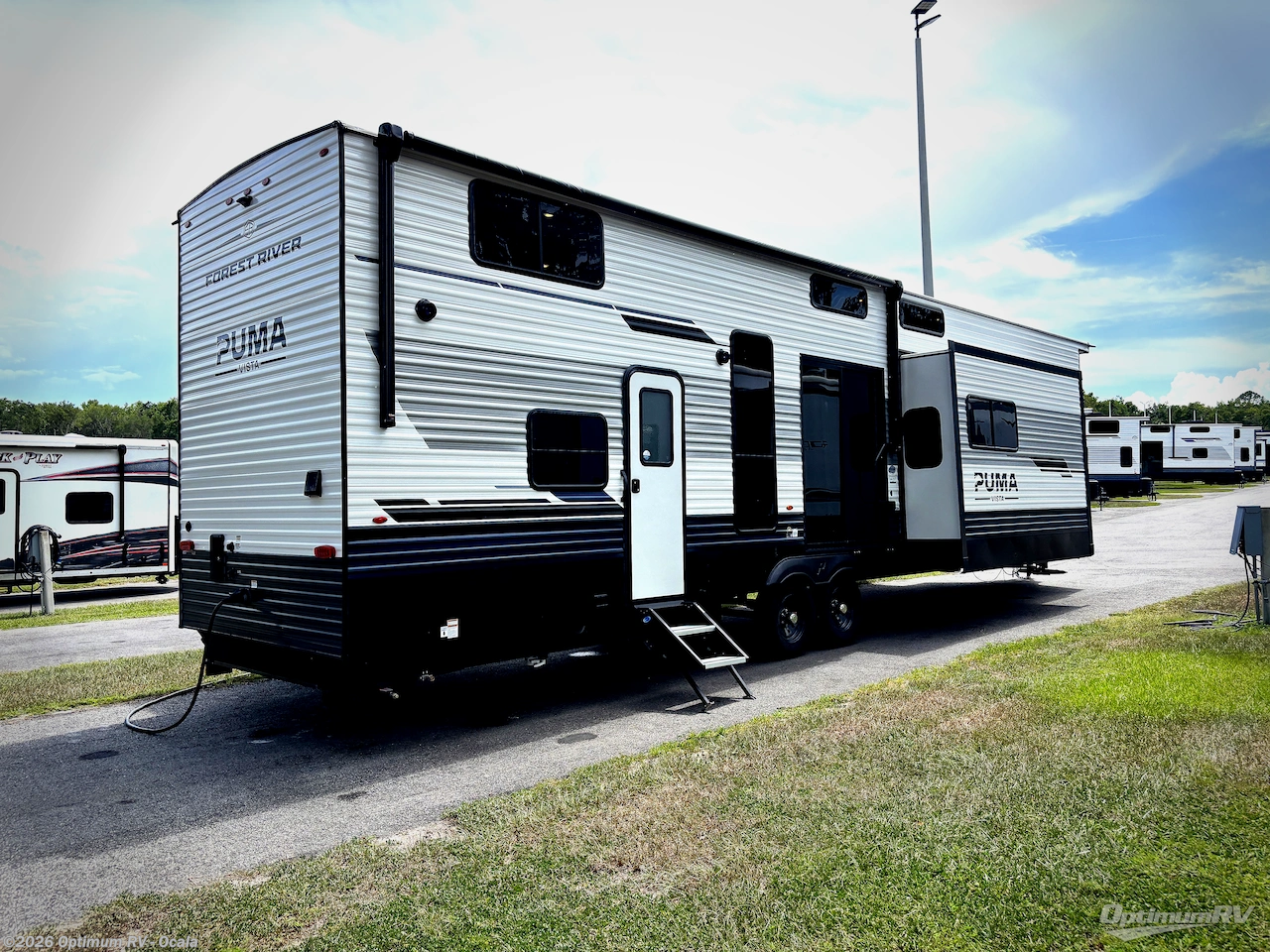 2027 Forest River Puma Vista 403LFT - New Destination Trailer For Sale by Optimum RV - Ocala in Ocala, Florida features Slideout, Awning