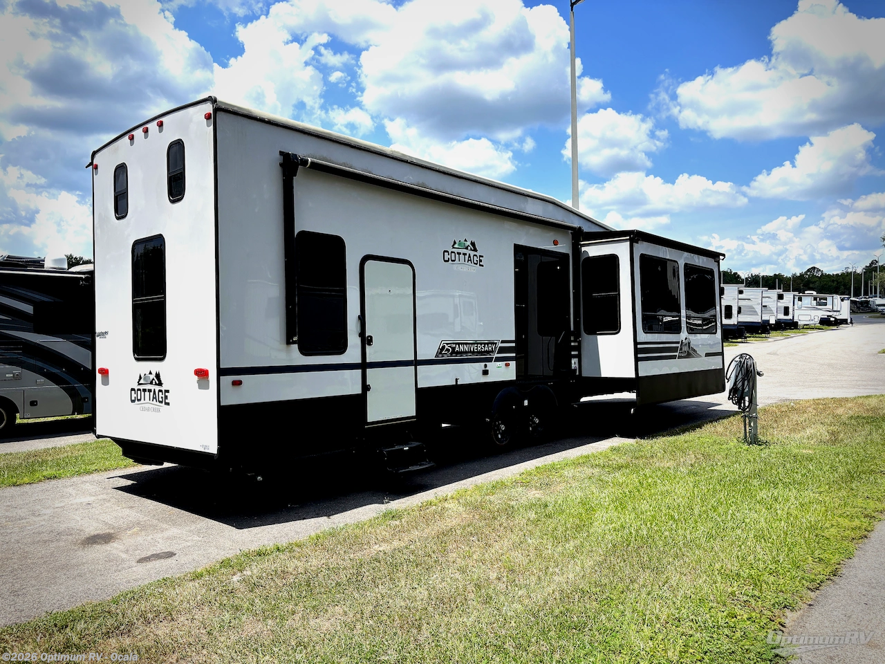 2024 Forest River Cedar Creek Cottage 40CDL - Used Destination Trailer For Sale by Optimum RV - Ocala in Ocala, Florida features Awning, Slideout