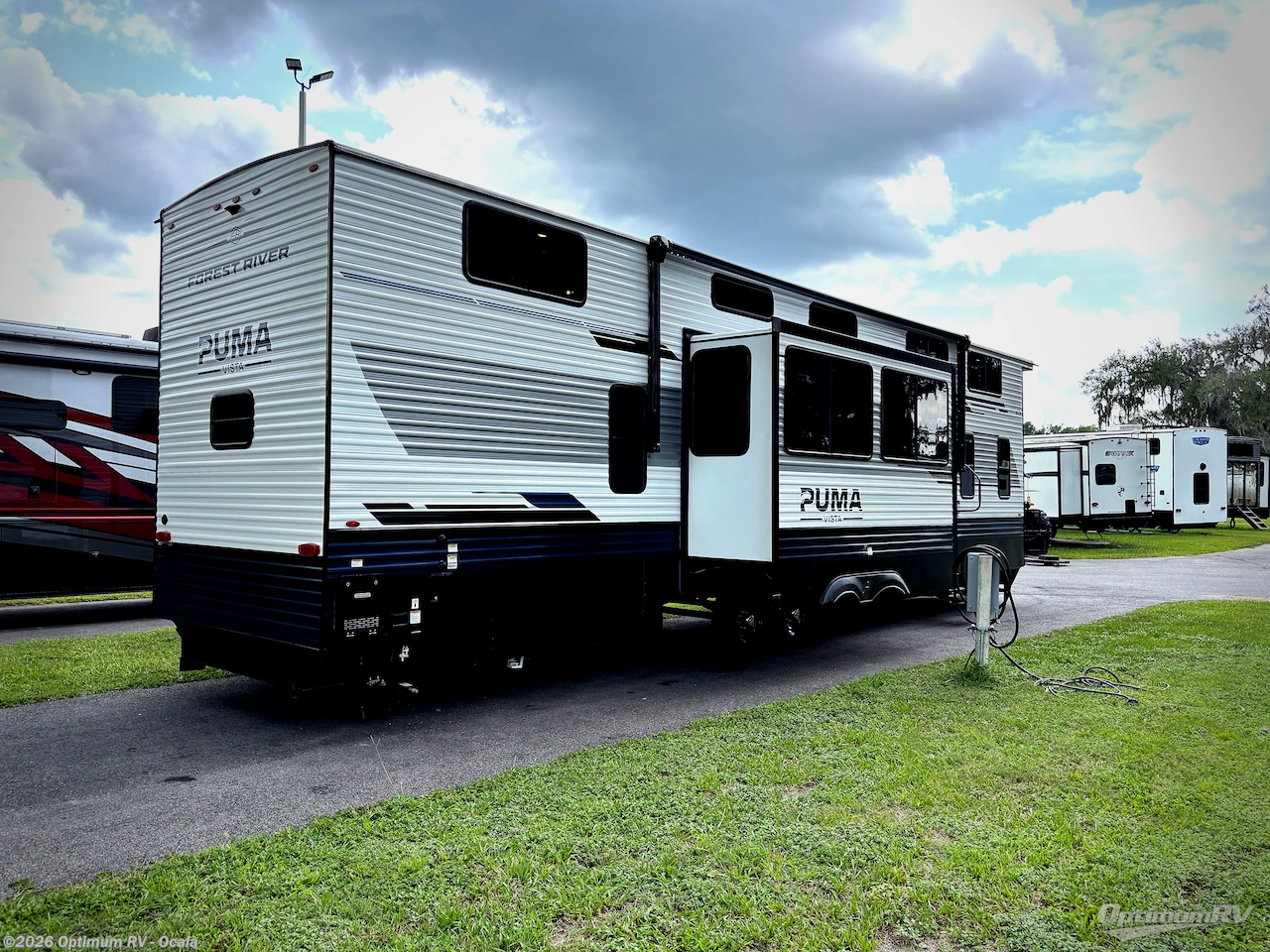 2027 Forest River Puma Vista 421LFT - New Destination Trailer For Sale by Optimum RV - Ocala in Ocala, Florida features Slideout, Awning