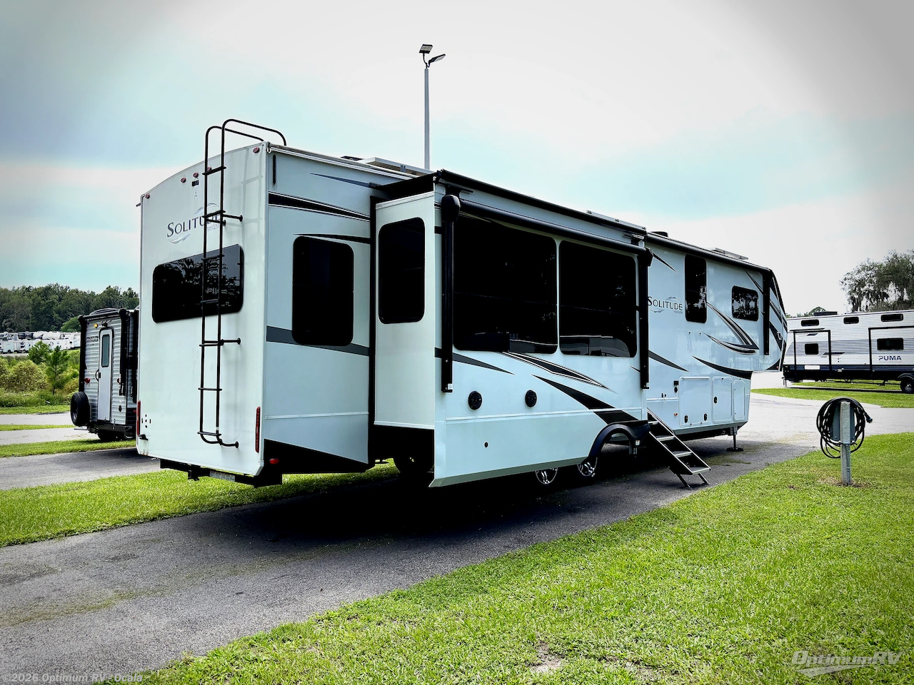 2023 Grand Design Solitude 378MBS - Used Fifth Wheel For Sale by Optimum RV - Ocala in Ocala, Florida features Awning, Slideout